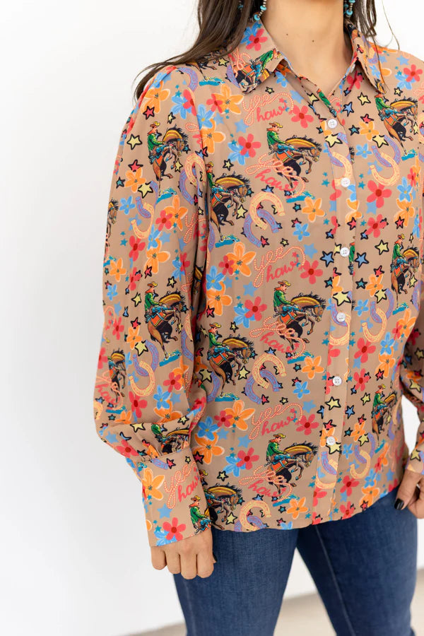 Colorful patterned shirt worn by a person on a white background