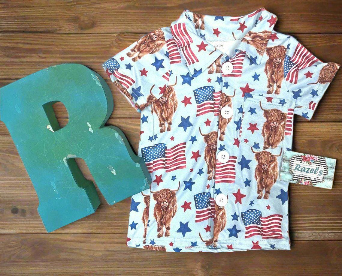 Get ready to celebrate the 4th of July in full-on Western style with our adorable Highland Cow & American FlaG BUTTON UP SHIRT ON A WOODEN BACKGROUND WITH RAZELS LETTER R