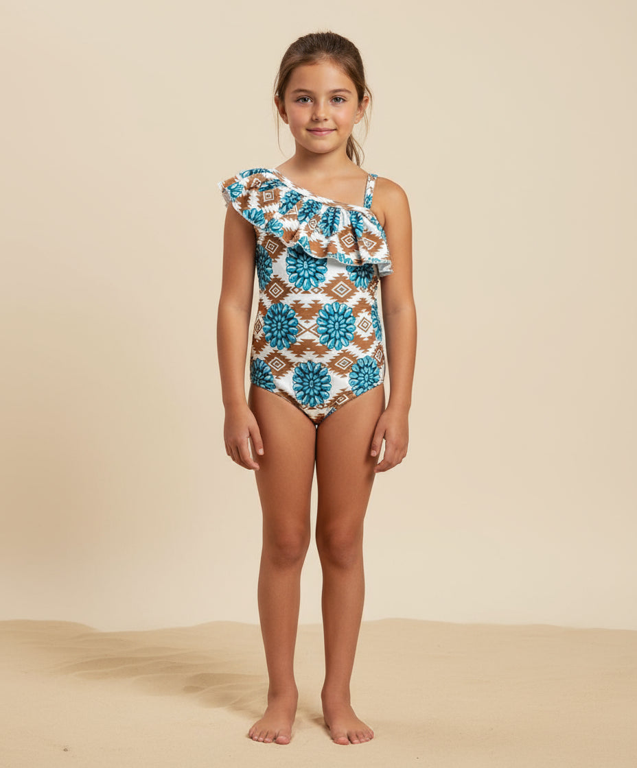 Cowgirl Swimsuit, Turquoise Conchos, Western Swimsuits, SOUTHWESTERN, Squash blossoms, Girls One piece swim, Ruffle Swimsuit, Girls' Western Swimsuit Two of our favorite things – Aztec prints and turquoise concho squash blossoms – come together in this stunning Western-inspired swimsuit! 😍 This girls' one-piece ruffle swimsuit is a must-have for little cowgirls who love bold, Southwestern style. Available 0-3 months - girls 12/14. Ships FREE $35+ order from Montana.