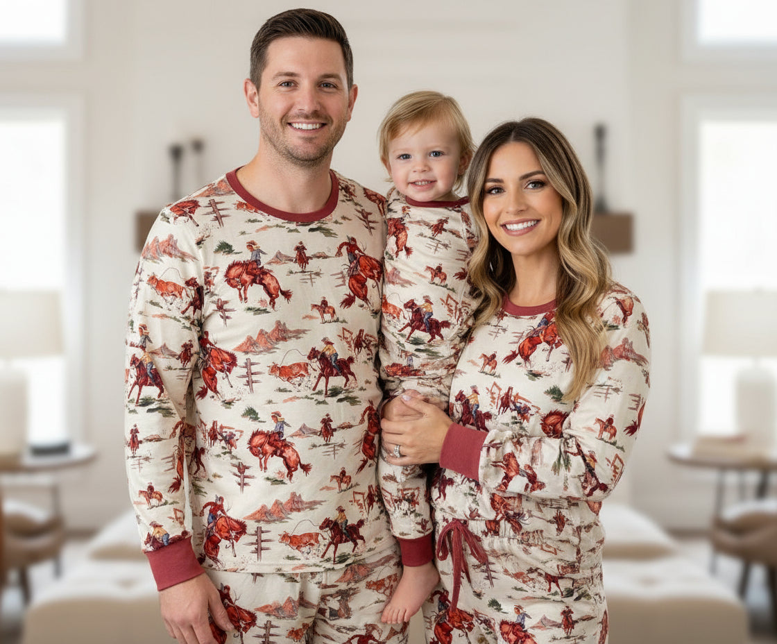 Retro Western Vintage Cowboy Pajamas: Bring the rodeo home with these Classic Western Pajamas from Razels! Featuring a vintage cowboy print with bucking broncs, roping steers, and steer wrestling. Available in baby 3/6 months - adult 4x! Ships FREE.