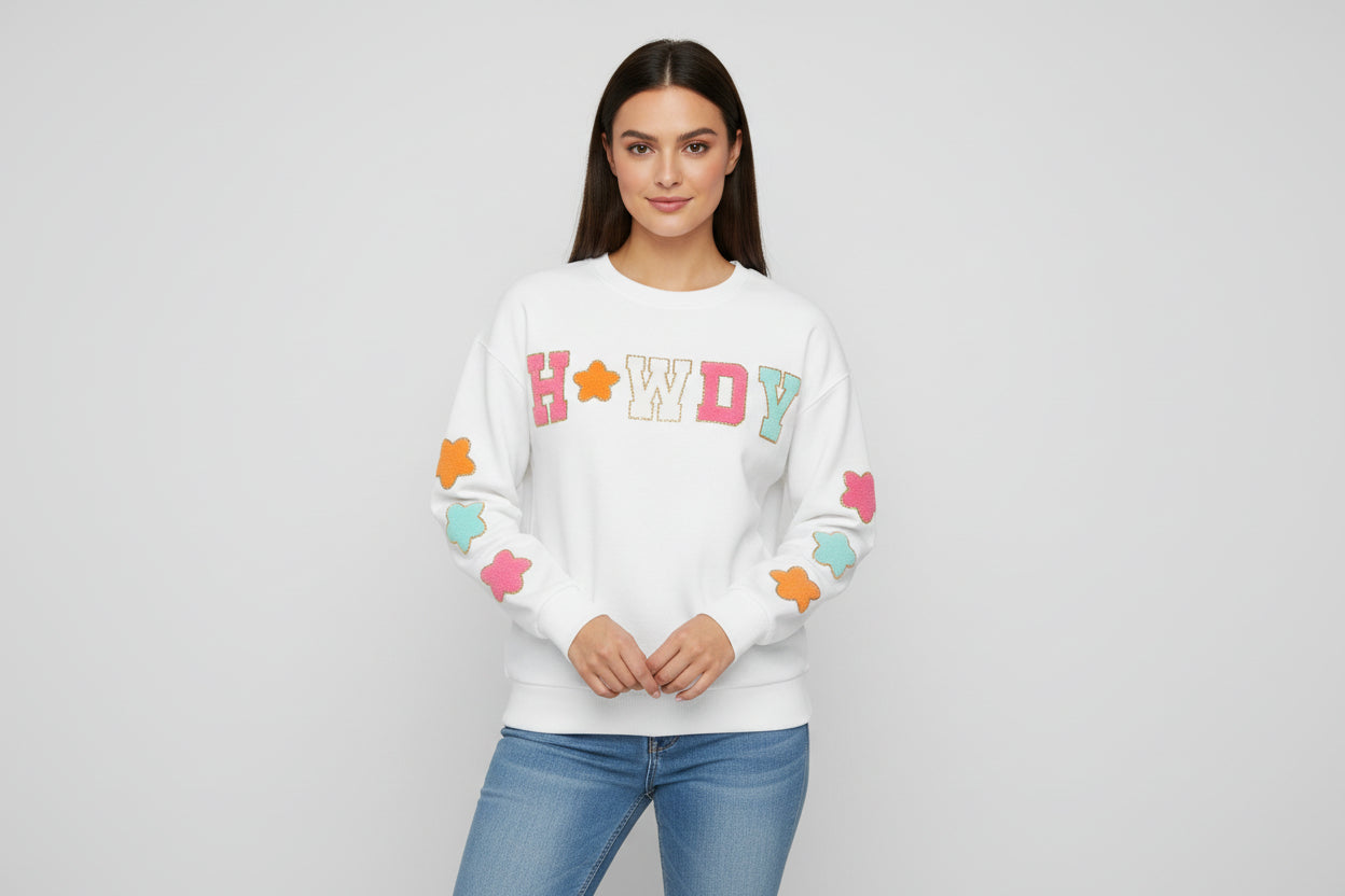 Howdy Sweatshirt – Glitter Patch Cowgirl Sweatshirt for Western Vibes! Add some sparkle to your casual wardrobe with our Howdy Sweatshirt. This women’s Western sweatshirt features a dazzling glitter patch “Howdy” design with matching stars!