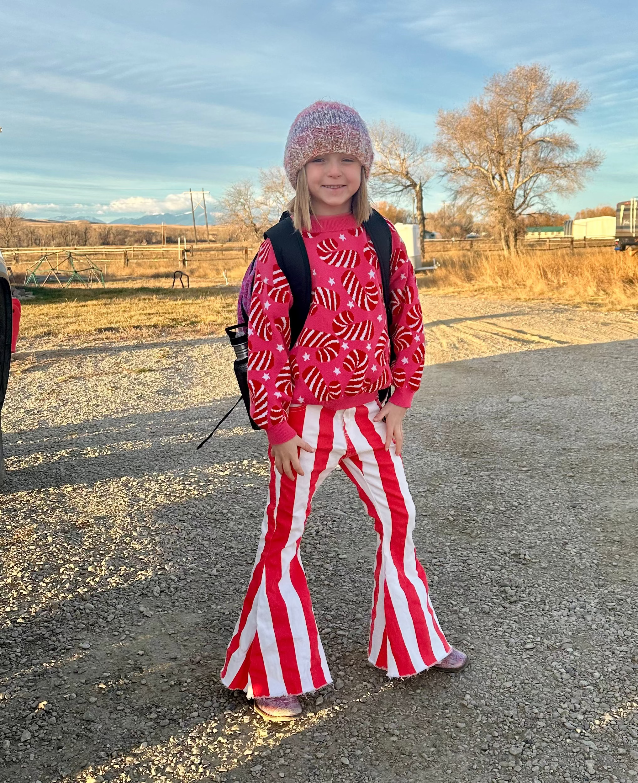 Jernie wearing Razels Red and White Striped Jeans with Candy Cane Sweater