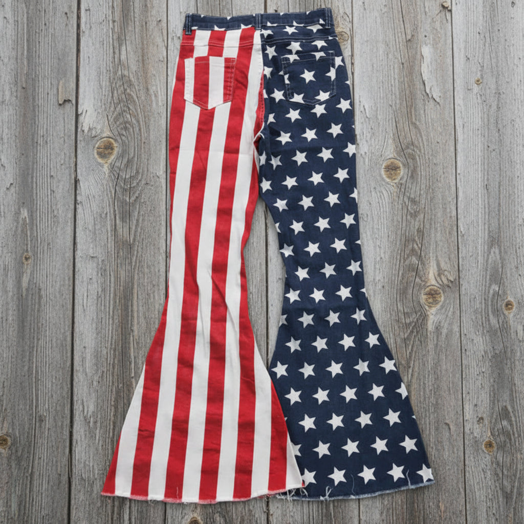 Flared jeans with American flag pattern on aBARNWOOD BACKGROUND