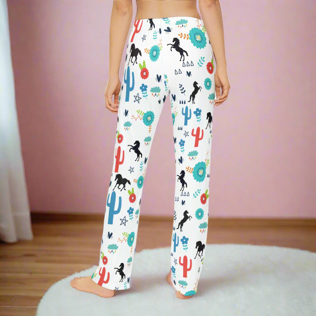 🌵🐴 Whimsical Desert Horse Lounge Pants for Girls – Boho Western Pajamas with Cowgirl Charm 🌈✨
Let her imagination gallop wild in these dreamy desert-print pajama pants! Featuring black silhouette horses running past turquoise and pink cacti, rainbow raindrops, stars, hearts, and wildflowers – this magical Western scene brings all the cowgirl energy she needs.
Perfect for cozy nights, twirling mornings, and everything in between! These lightweight pants are crafted from ultra-soft brushed polyester wit