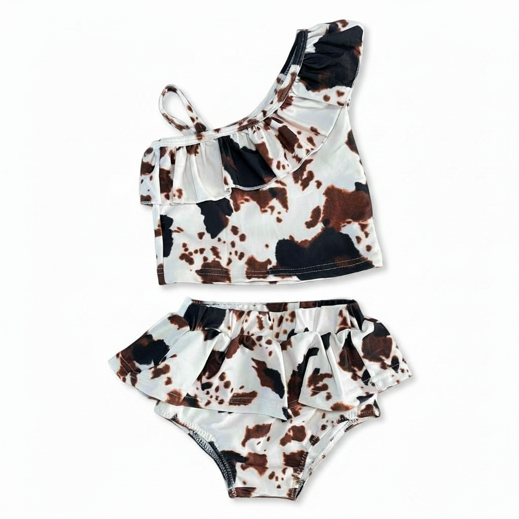 Cow print bikini set on a white background