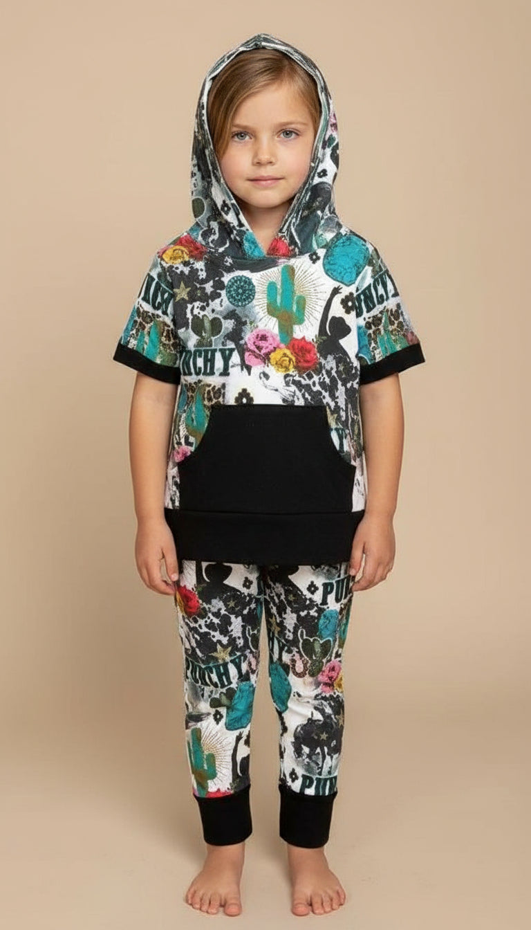 Girls Cowgirl Outfit | Western Hoodie Jogger Set for Kids This Girls PUNCHY Cowgirl Outfit is full of retro cowboy vibes. This Western outfit features an allover Western print with matching jogger pants and a lightweight, short-sleeved hoodie top.