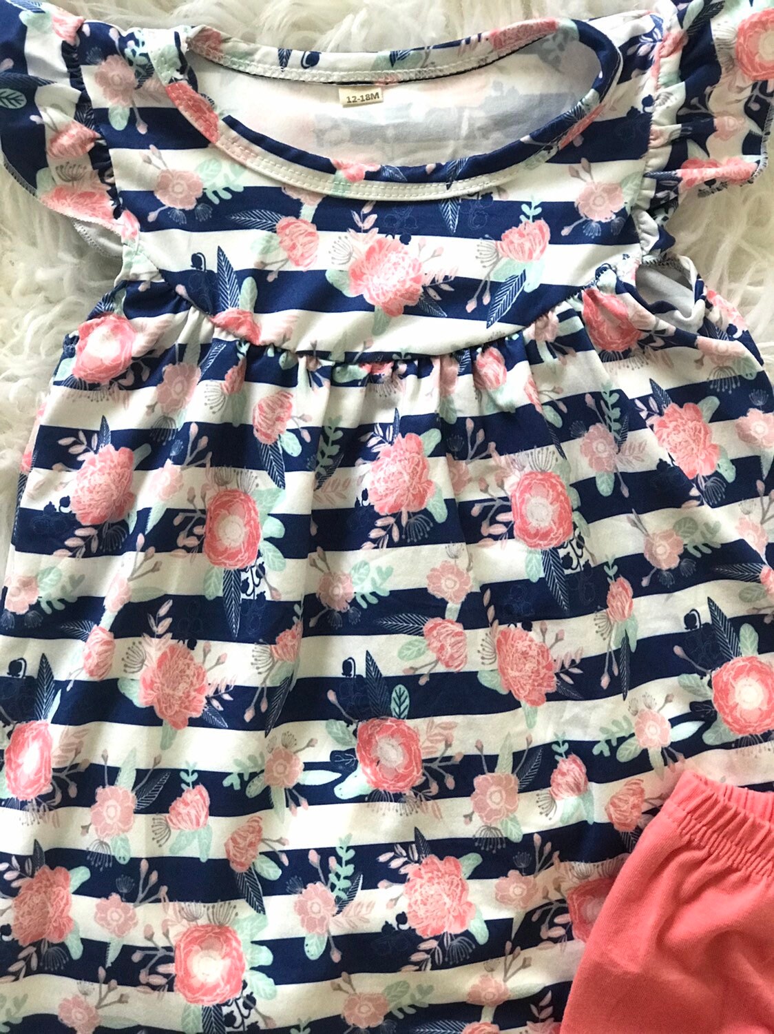 🌸 LAST ONE! 12/18M Boho Toddler Summer Outfit – Flutter Sleeve Top & Pink Ruffle Shorts | $10! One of my absolute favorites! 💕 This adorable two-piece set is perfect for sunny days and playdates in style. The top features a blue and white stripe base with the sweetest flowers & feathers design and flutter sleeves for that extra girly charm. Paired with soft pink ruffle icing shorts—it’s a total warm-weather win! ☀️ ✓ Lightweight & comfy ✓ Flutter sleeve detail = swoon!