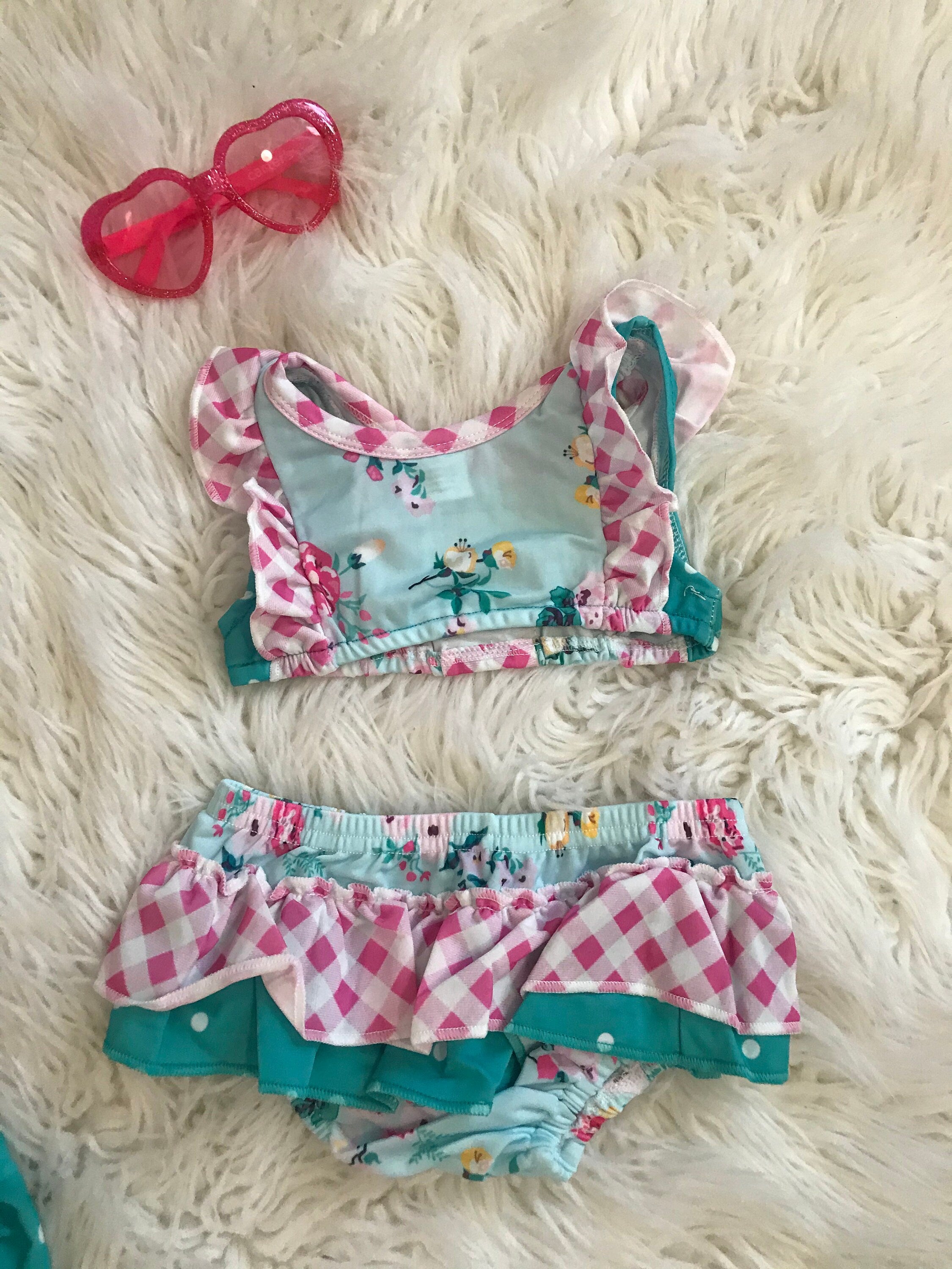 🌸 Floral Ruffle Butt Bikini – Polka Dot Flower Ruffle Swim Suit | ONLY $10!
Flowers, polka dots, and pink gingham... oh my goodness! 😍 How adorable is this ruffle butt bikini?! It’s the cutest way to keep your little one stylish and comfy by the pool. 🍭
Perfect for summer fun, this swimsuit is as sweet as can be—and it’s just $10 for the last one! Don't miss out!
✓ Floral and polka dot design with pink gingham accents
✓ Cute ruffle butt detail for extra flair
