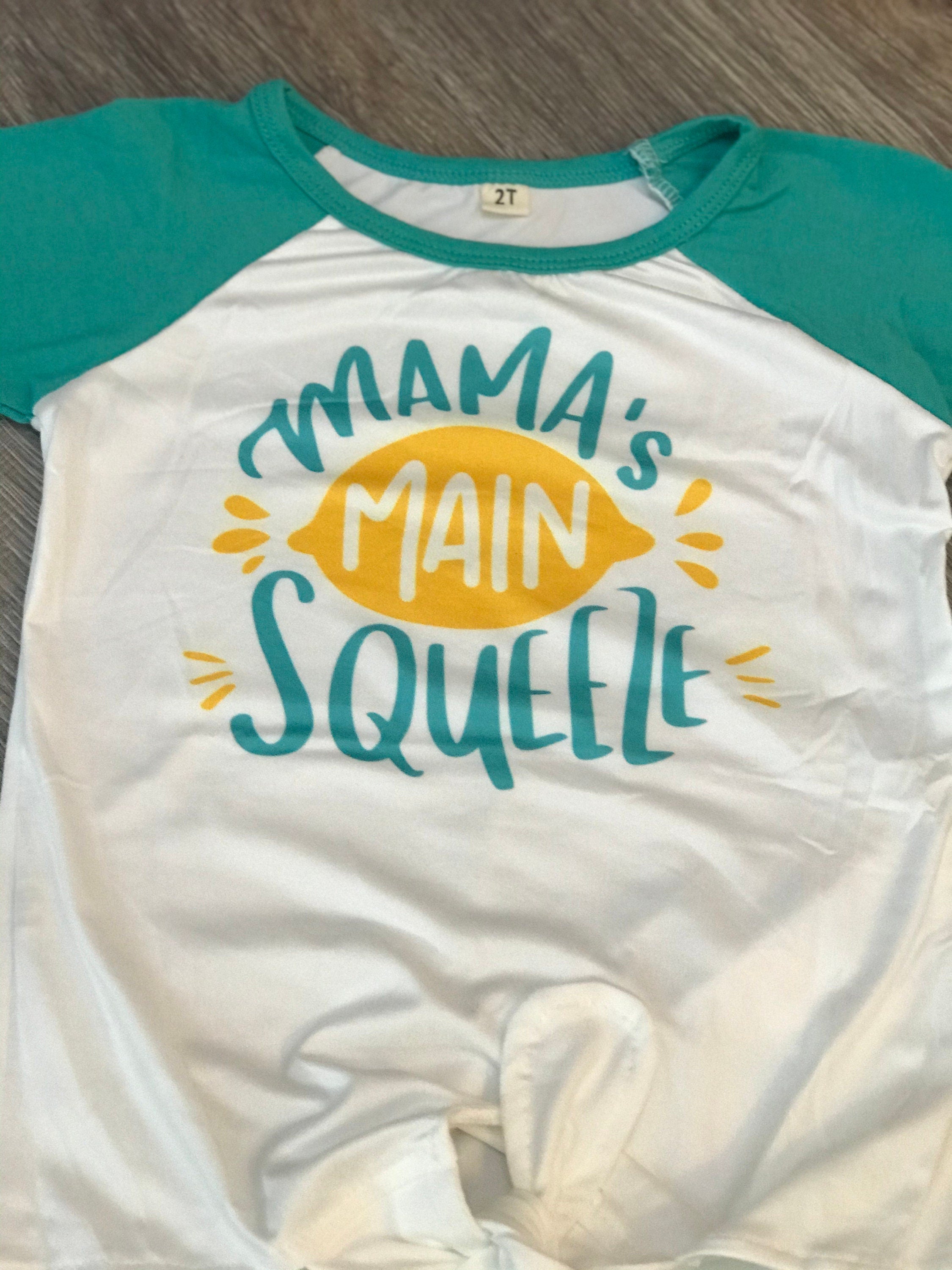 🍋 Mama's Main Squeeze Bell Bottom Outfit - a cheerful lemon-themed outfit! This adorable set features a playful "Mama's Main Squeeze" t-shirt and bell bottoms with an all over lemon print, adding a burst of sunshine to any day.