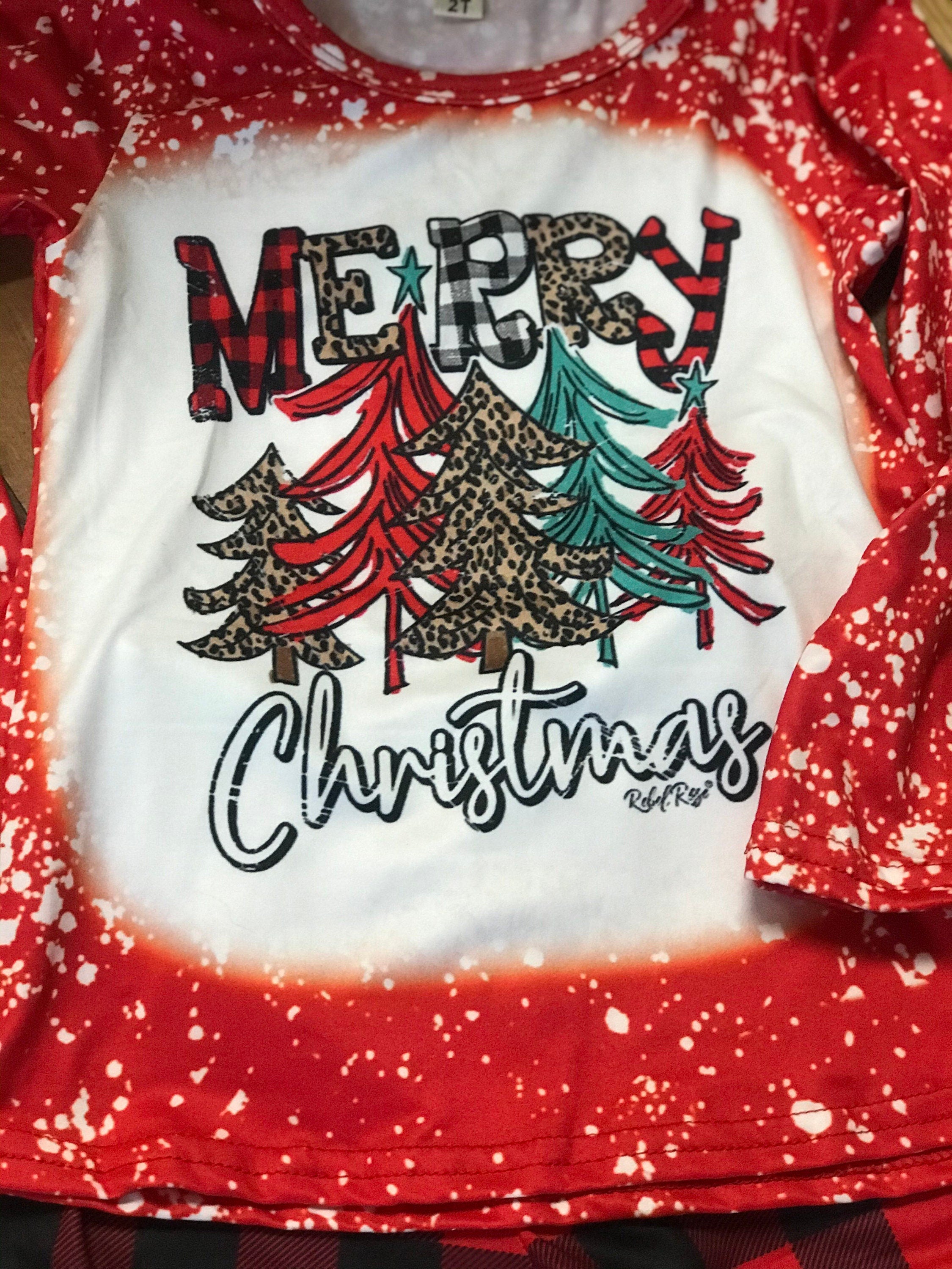 girls christmas outfits featuring red and black checkered buffalo plaid trouser pants and your choice of Merry Christmas or It's the Most Wonderful Time of the Year Long Sleeve Shirts