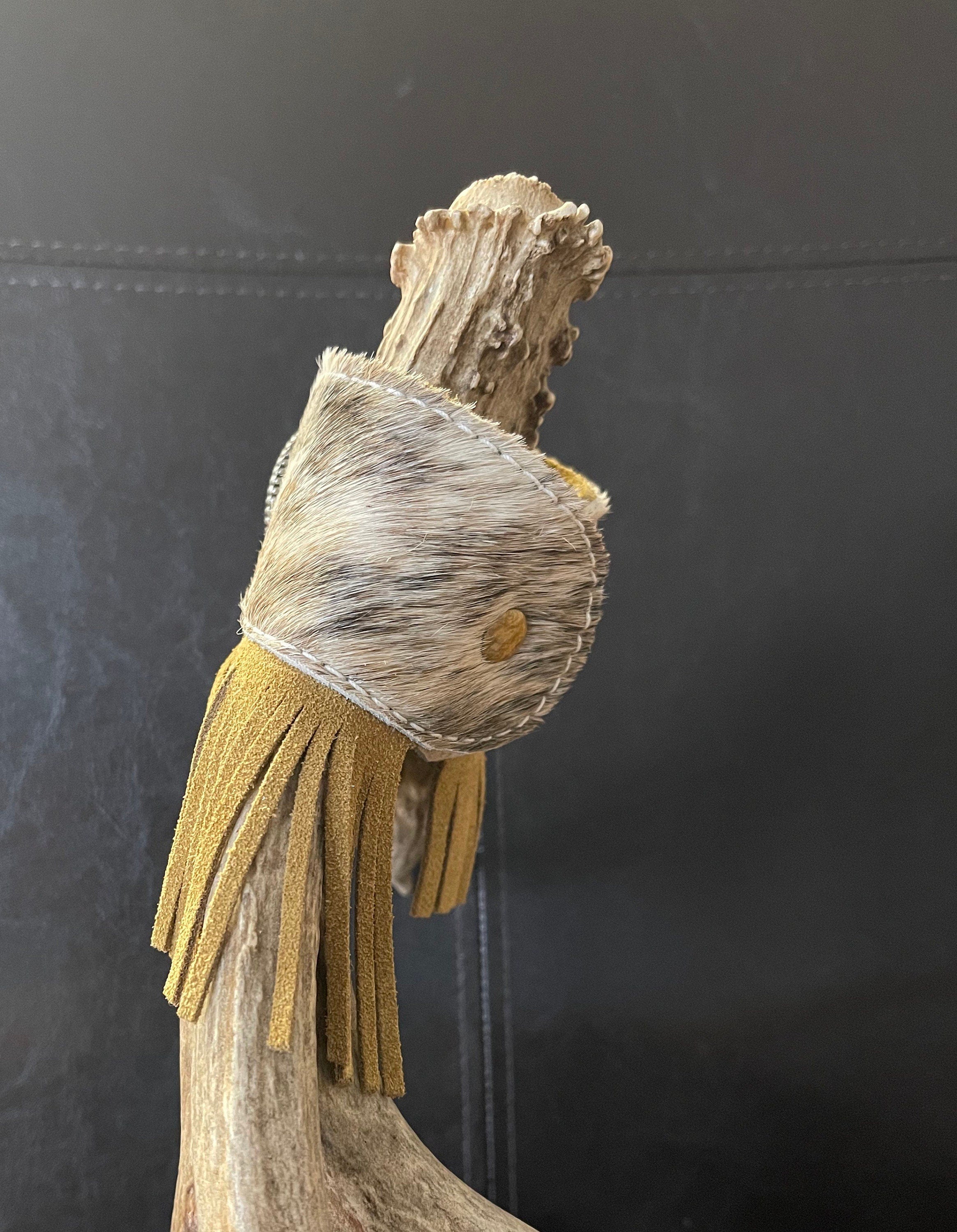 fringe 🔥 Brindle Leather Fringe Cuff with Tribal Silver Concho – One of a Kind! 🔥
Make a bold statement with this stunning Western cuff bracelet! Crafted from brindle hair-on-hide, this cowhide bracelet features a striking tribal silver concho and eye-catching leather fringe that hangs beautifully under the wrist with its unique diagonal cut.
✔ Premium brindle cowhide leather
✔ Tribal silver concho –
✔ Diagonal-cut leather fringe –
✔ Adjustable fit – fits up to a 7 ½” wrist
✔ 2” wide