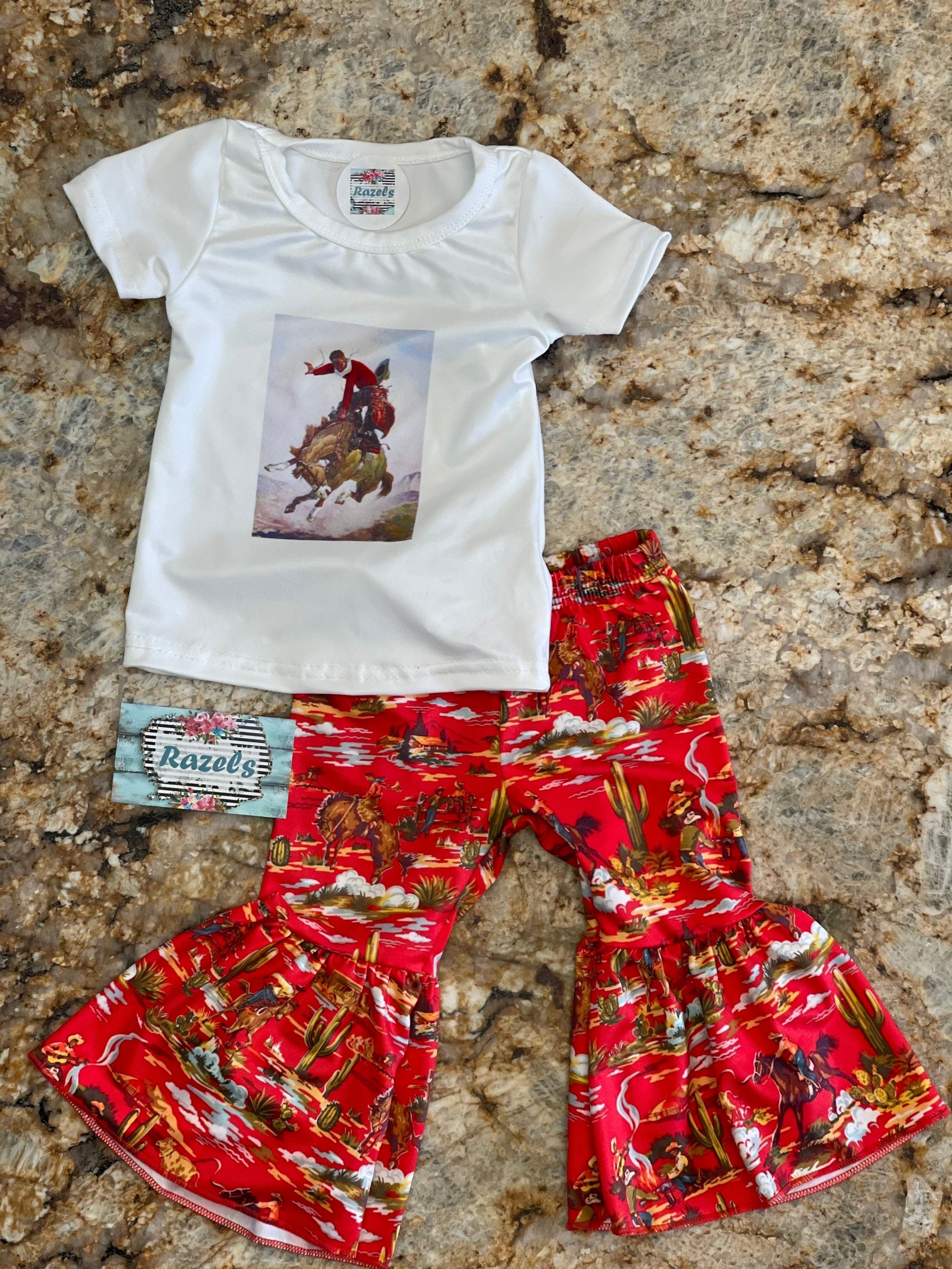 Yeehaw! The Perfect COWGIRL OUTFIT for Girls is Here! 🤠
Let your little one embrace vintage Western charm with this adorable Bell Bottom Outfit! Featuring bold Red Bell Bottoms and a stylish Cowboy T-Shirt with a retro Vintage Cowboy Cowgirl design, this set is perfect for rodeos, playdates, and everyday adventures.
✨ Soft & Stretchy (95% Cotton, 5% Spandex) – All-Day Comfort
✨ True to Size (TTS) for the Perfect Fit
✨ Perfect for Rodeos, Photos, & Western-Themed Events