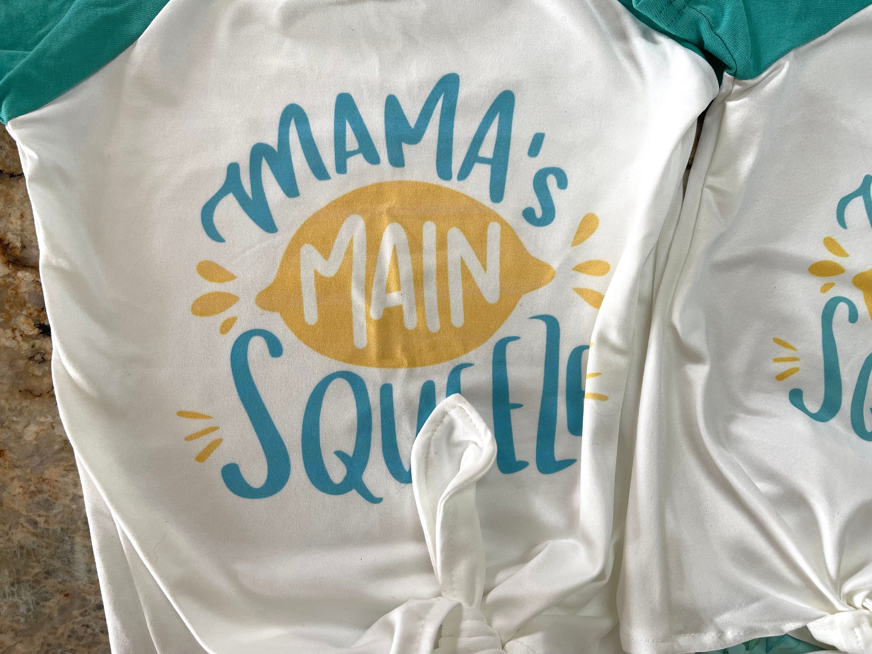 🍋 Mama's Main Squeeze Bell Bottom Outfit - a cheerful lemon-themed outfit! This adorable set features a playful "Mama's Main Squeeze" t-shirt and bell bottoms with an all over lemon print, adding a burst of sunshine to any day.