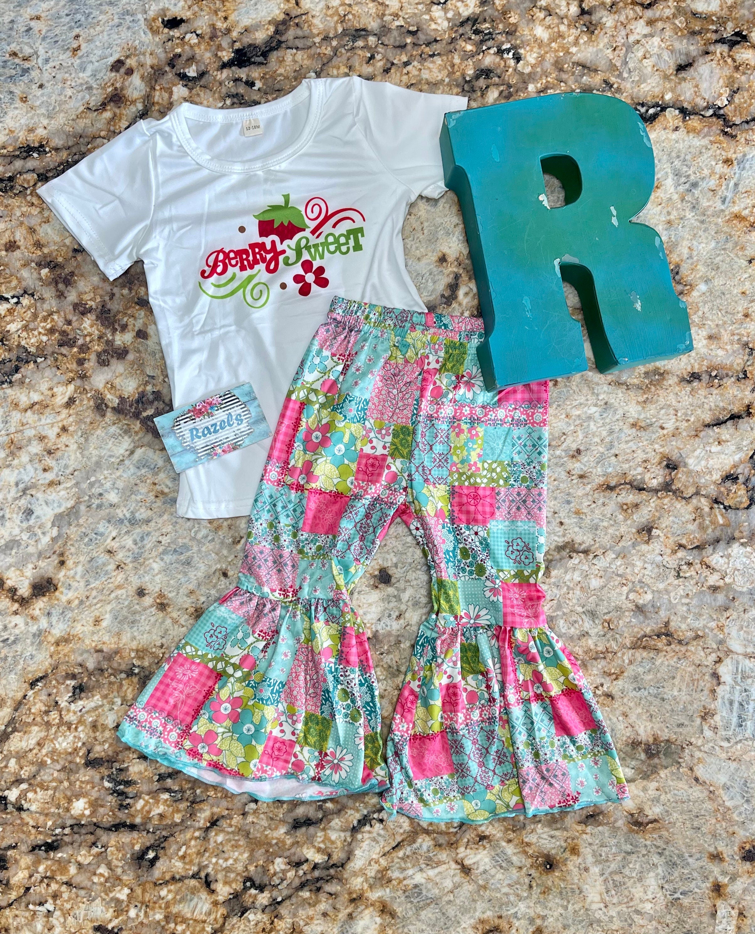 🍓 ONLY $10 – 2T & 3T – FINAL TWO!
O’ my stars… or should we say berries?! 🍓✨
This “Berry Sweet” Bell Bottom Outfit is almost too cute to handle — and at this price?! Steal alert!
💖 Patchwork bell bottoms that are seriously stinkin’ cute
💫 Coordinating top full of berry sweet charm
👖 95% Cotton / 5% Spandex – soft, comfy & perfect for play
🧼 Easy care – just machine wash & dry!