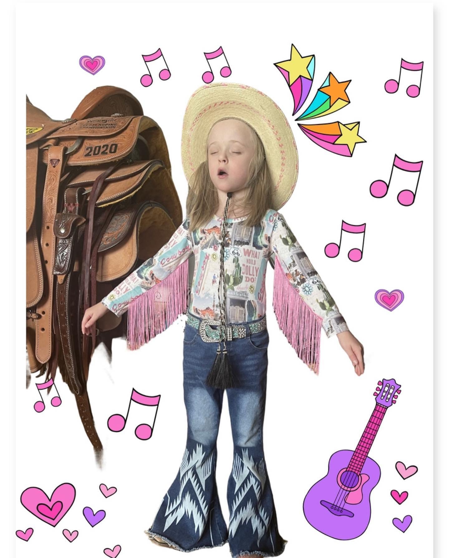 Get ready to dazzle with our adorable What Would Dolly Do? Cowgirl Shirt & Fringe Bodysuit. 
 The button-up shirt features a bold Western-inspired design, while the fringe bodysuit adds flair in vibrant pink. Shop Razels for Girls Western Wear
