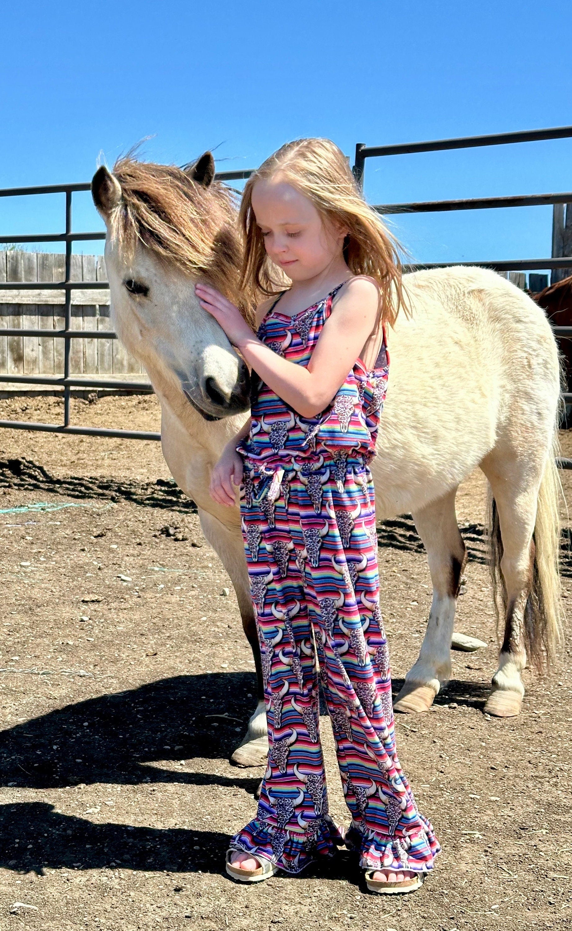 The Western Bell Bottom Jumpsuit is here to steal the spotlight! 🤠😍 This Cowgirl Outfit is a total showstopper, blending style and comfort effortlessly. With its Serape Jumpsuit vibes, cow skulls, and cheetah print, it’s the perfect mix of Western flair and bold fashion.
Designed for all-day wear, the Bell Bottom Romper features an elastic waistband for the perfect fit, making it as practical as it is stylish. Plus Razels ships all orders $35+ FREE from MONTANA TODAY!