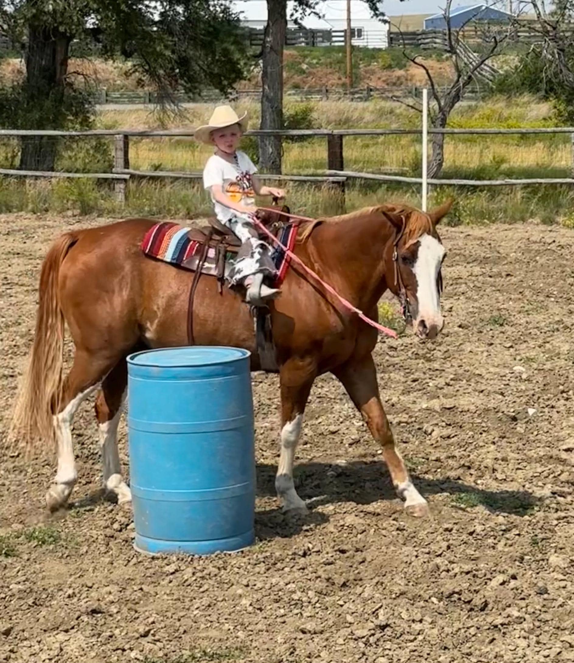 running the barrels in cowprint jeans and girl gang tee