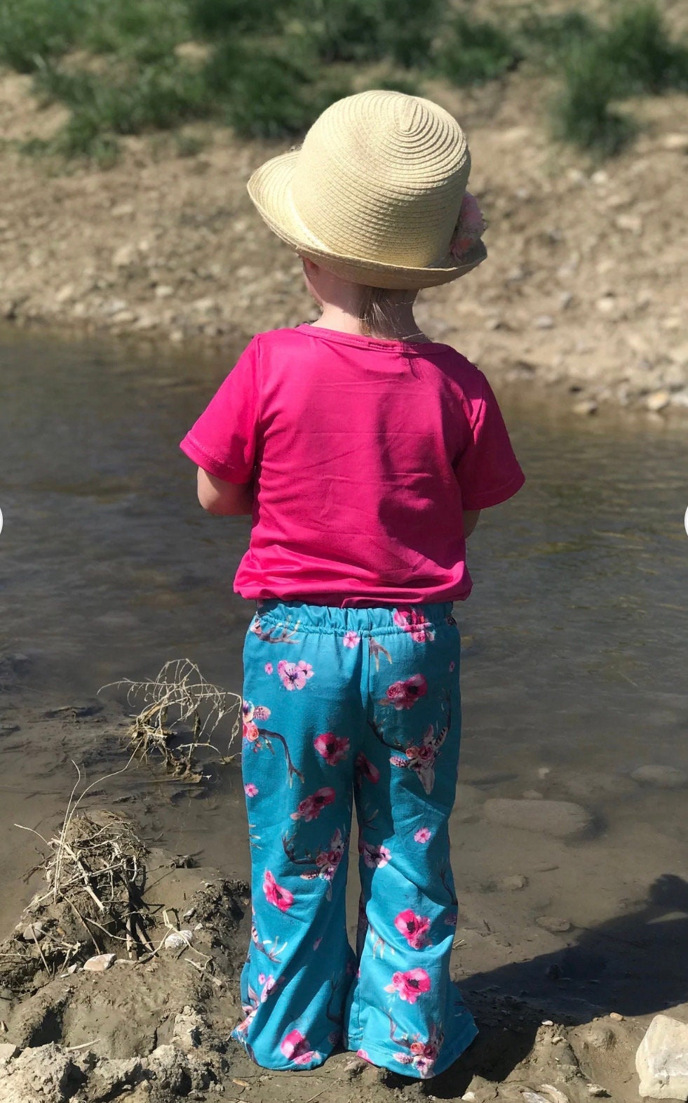 Baby & Toddler Bell Bottoms in a fun flower skull boho print! Perfectly stretchy with the ideal flare, these versatile pants are great for dressing up or down. and are machine washable! Shop Razels for more! Ships FREE with $35+ purchase