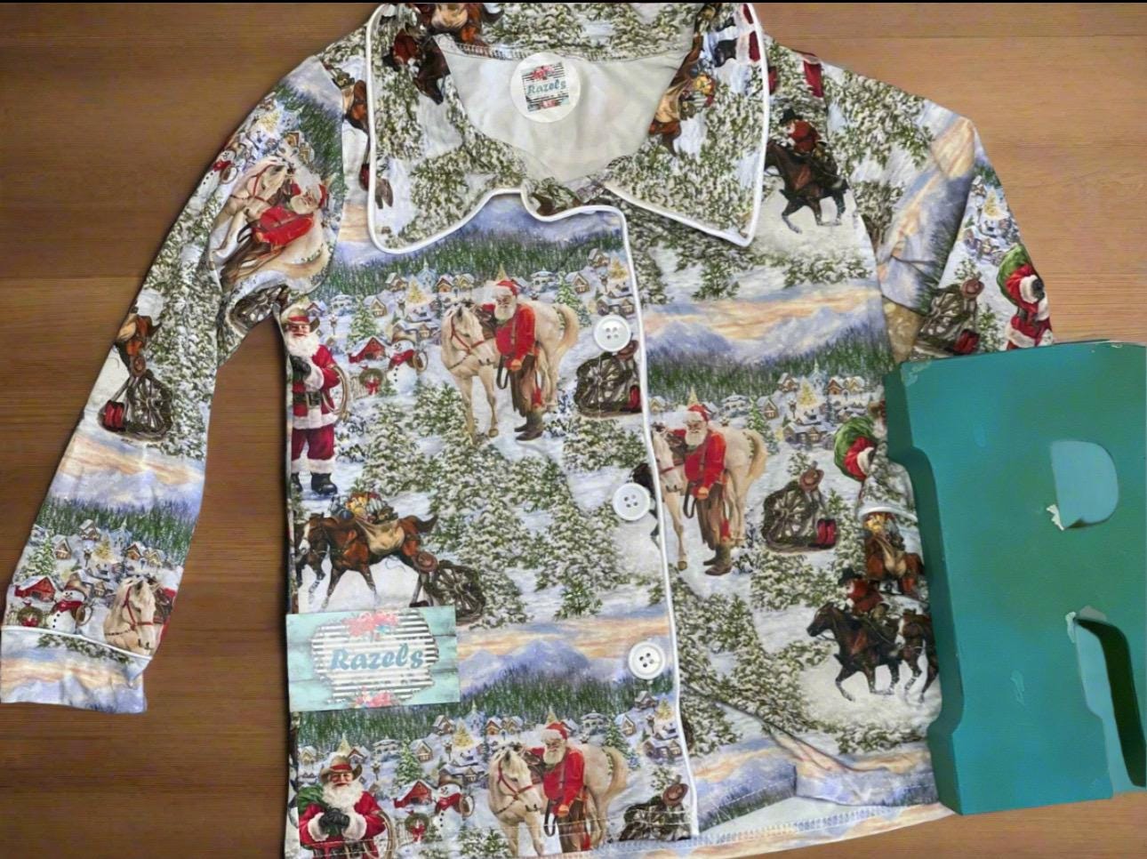 ORIGINAL Cowboy Santa Pajamas featuring Western Santa and his best horses. This button-down pajama style is perfect for the whole family.