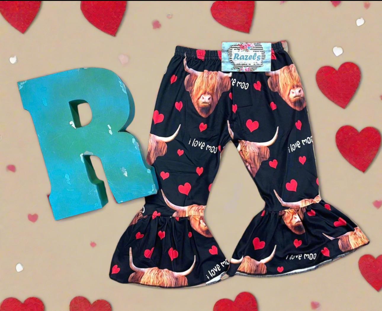 Girls Black bell bottom pants that feature Scottish highlander cows, red hearts and the words I Love MOO