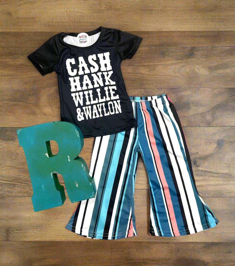 Girls Country Music bell bottom outfit. The outfit features black t-shirt with CASH, HANK, WILLIE, AND WAYLON scrolled across the front. Bell bottom pants feature stripes in pink, blue, black, white and turquoise.
