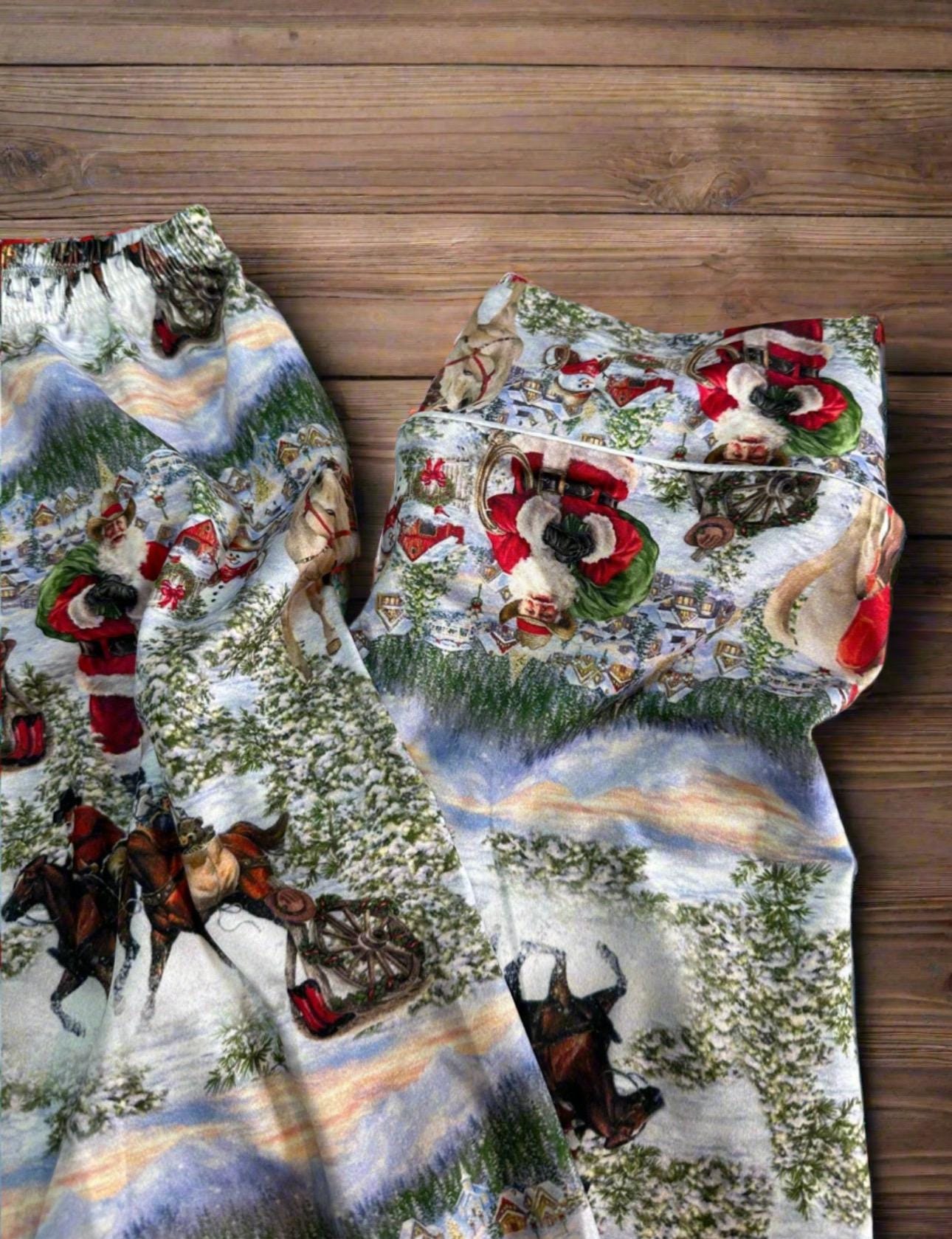 ORIGINAL Cowboy Santa Pajamas featuring Western Santa and his best horses. This button-down pajama style is perfect for the whole family.
