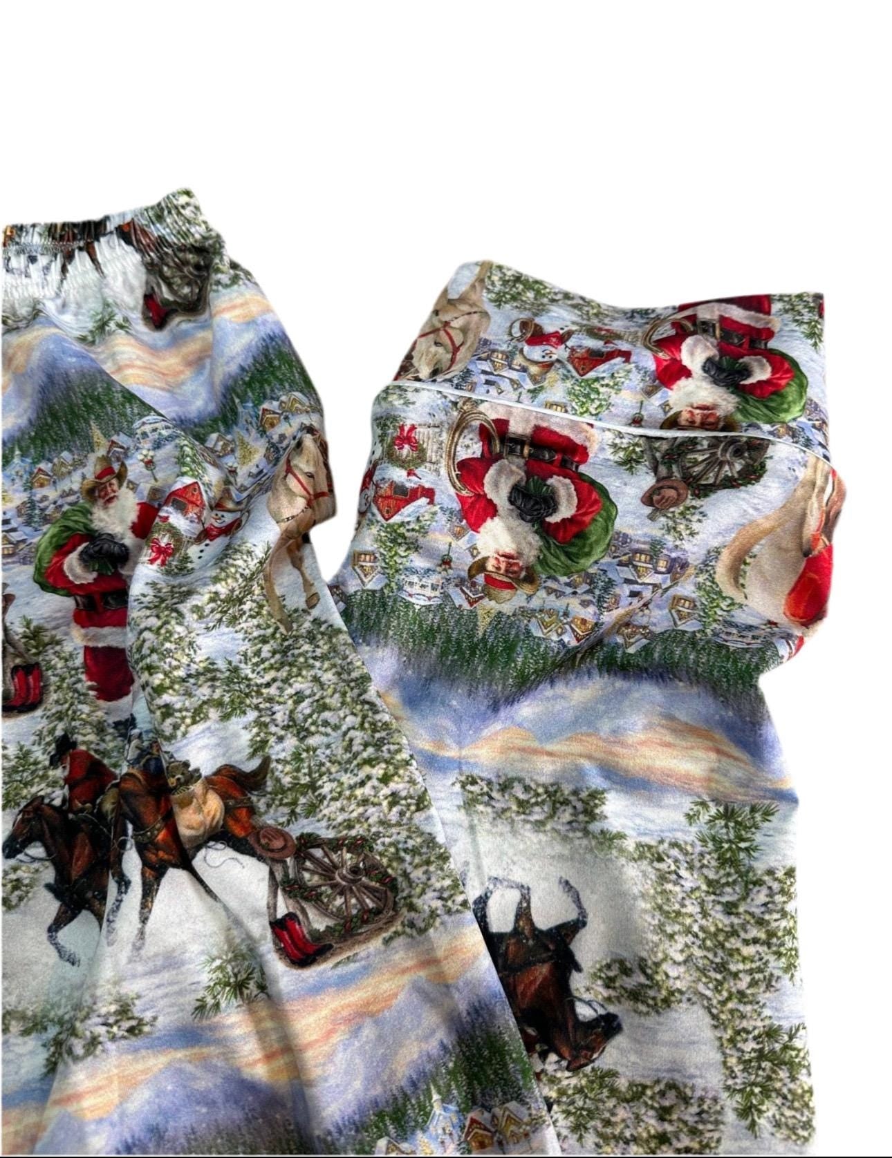 ORIGINAL Cowboy Santa Pajamas featuring Western Santa and his best horses. This button-down pajama style is perfect for the whole family.