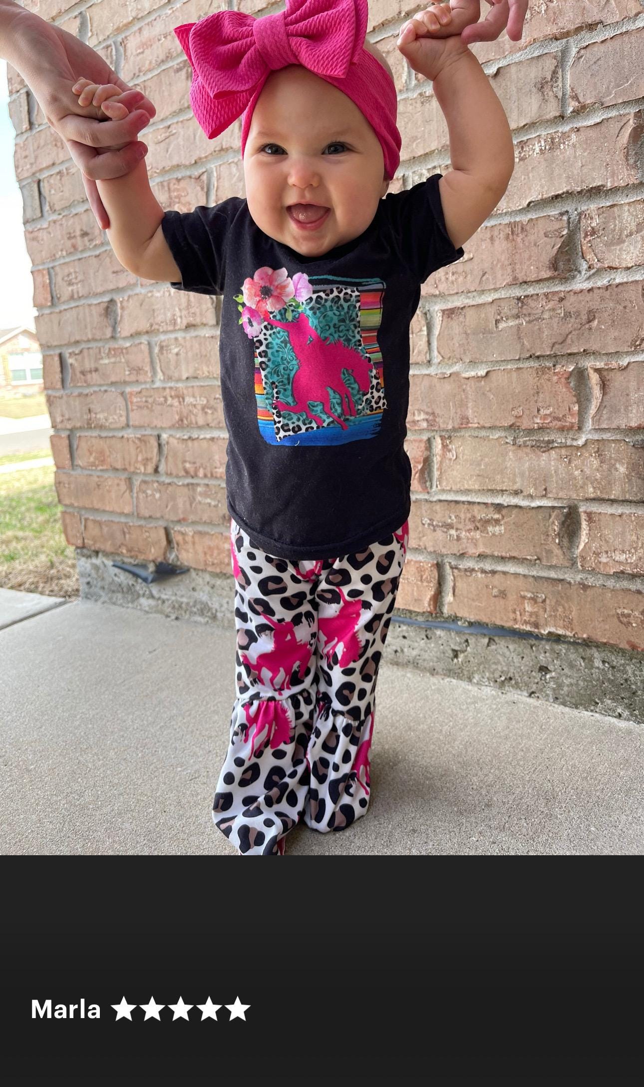 Cowgirl Bell Bottom Outfit featuring Pink Bronc Rider silhouettes and bold animal print! Perfect for rodeo fans and little ones who love a touch of Western flair, this Girls Bell Bottom Set is both stylish and fun. Ships FREE with $35+ order