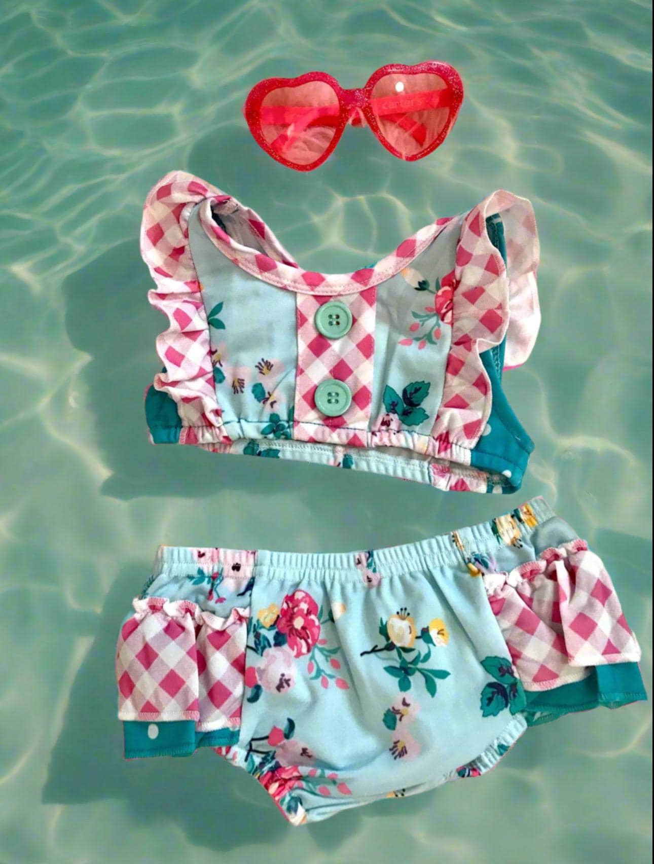 🌸 Floral Ruffle Butt Bikini – Polka Dot Flower Ruffle Swim Suit | ONLY $10!
Flowers, polka dots, and pink gingham... oh my goodness! 😍 How adorable is this ruffle butt bikini?! It’s the cutest way to keep your little one stylish and comfy by the pool. 🍭
Perfect for summer fun, this swimsuit is as sweet as can be—and it’s just $10 for the last one! Don't miss out!
✓ Floral and polka dot design with pink gingham accents
✓ Cute ruffle butt detail for extra flair