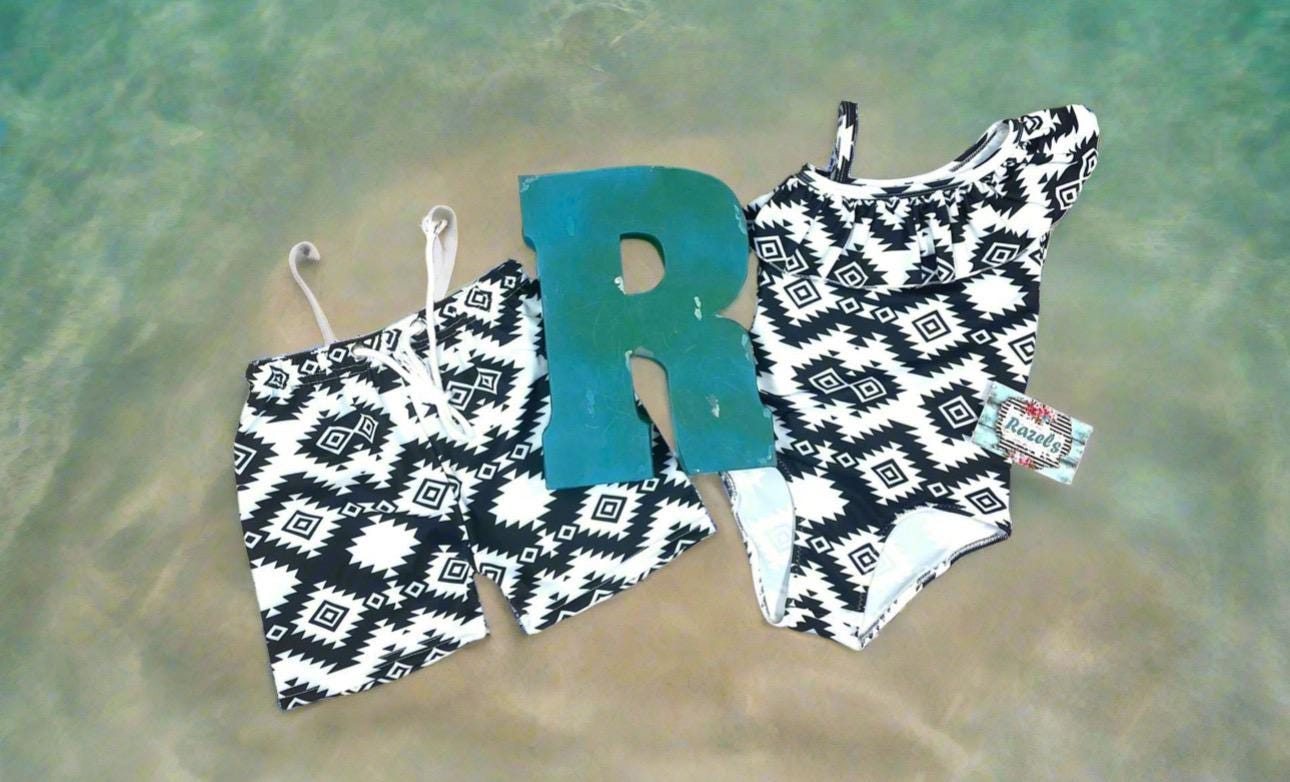 Matching Western Swimsuits for Kids 🖤🤍  Western Black and White Swimsuits, Boys Swim Trunks, Girls One Piece Swim
How fabulous are these matching swimsuits for your little cowboys and cowgirls?! Western sibling swimsuits have never been cuter! Featuring a stunning black and white Aztec/geometric pattern, these swimsuits come in your choice of:
✔️ Boys Trunks (can double as day shorts!)
✔️ Girls' One-Piece Swimsuit
SHIPS FREE FROM MONTANA WITH $35+ PURCHASE