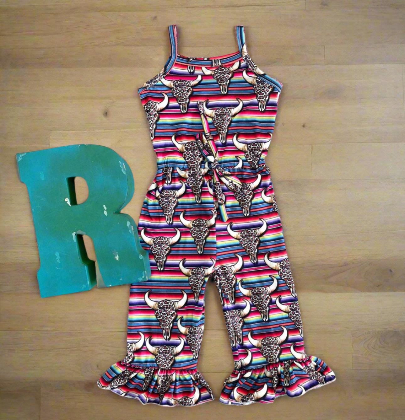 The Western Bell Bottom Jumpsuit is here to steal the spotlight! 🤠😍 This Cowgirl Outfit is a total showstopper, blending style and comfort effortlessly. With its Serape Jumpsuit vibes, cow skulls, and cheetah print, it’s the perfect mix of Western flair and bold fashion.
Designed for all-day wear, the Bell Bottom Romper features an elastic waistband for the perfect fit, making it as practical as it is stylish. Plus Razels ships all orders $35+ FREE from MONTANA TODAY!