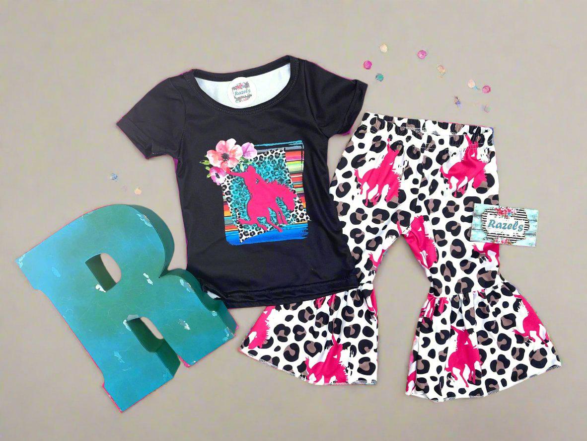 Cowgirl Bell Bottom Outfit featuring Pink Bronc Rider silhouettes and bold animal print! Perfect for rodeo fans and little ones who love a touch of Western flair, this Girls Bell Bottom Set is both stylish and fun. Ships FREE with $35+ order