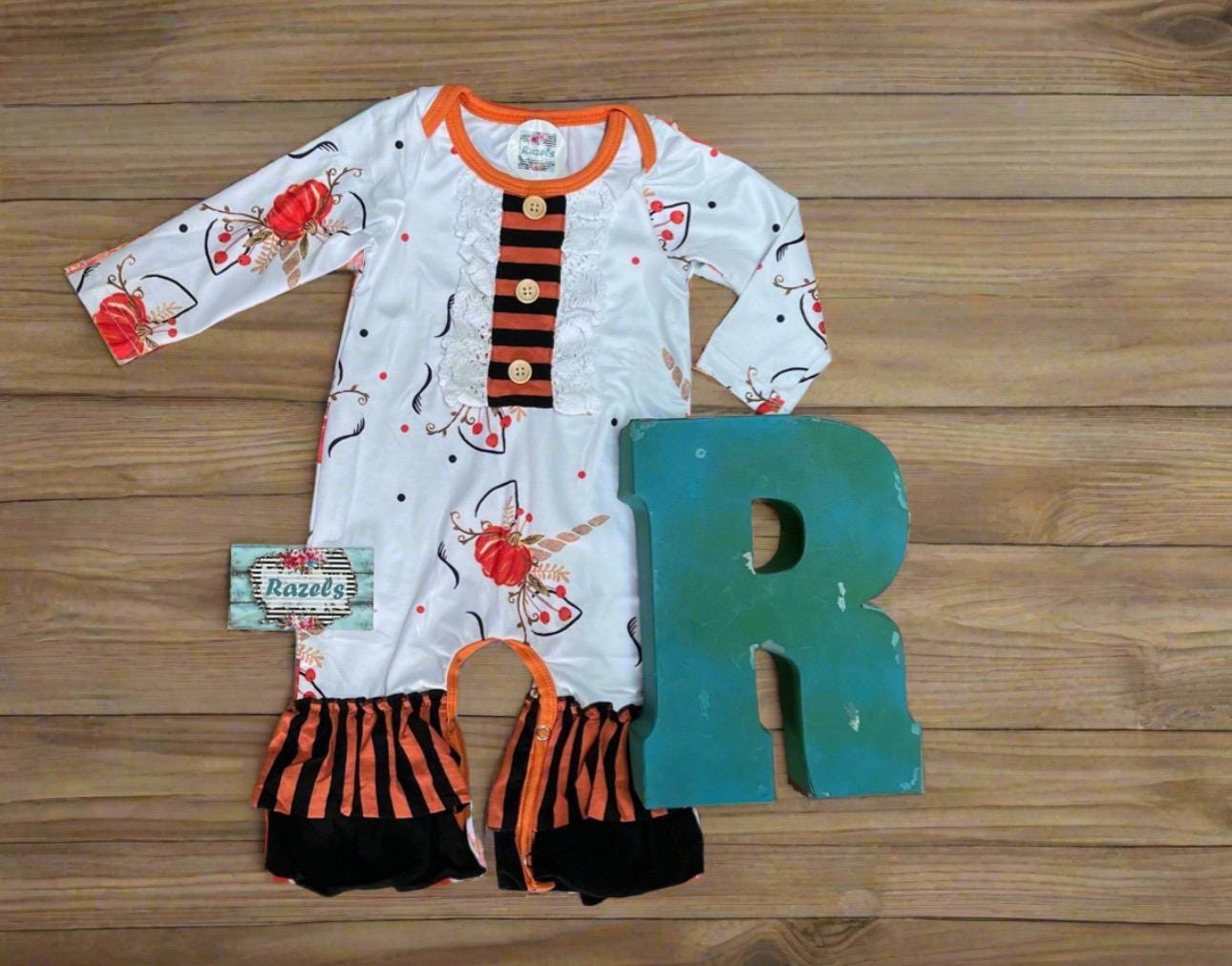 Adorable Pumpkin Unicorn print dress and romper for fall! Romper has split shoulders and leg snaps for easy changes, while the dress features flutter sleeves. Made from a soft, stretchy cotton blend for comfort all season. Think Fall photoshoots!