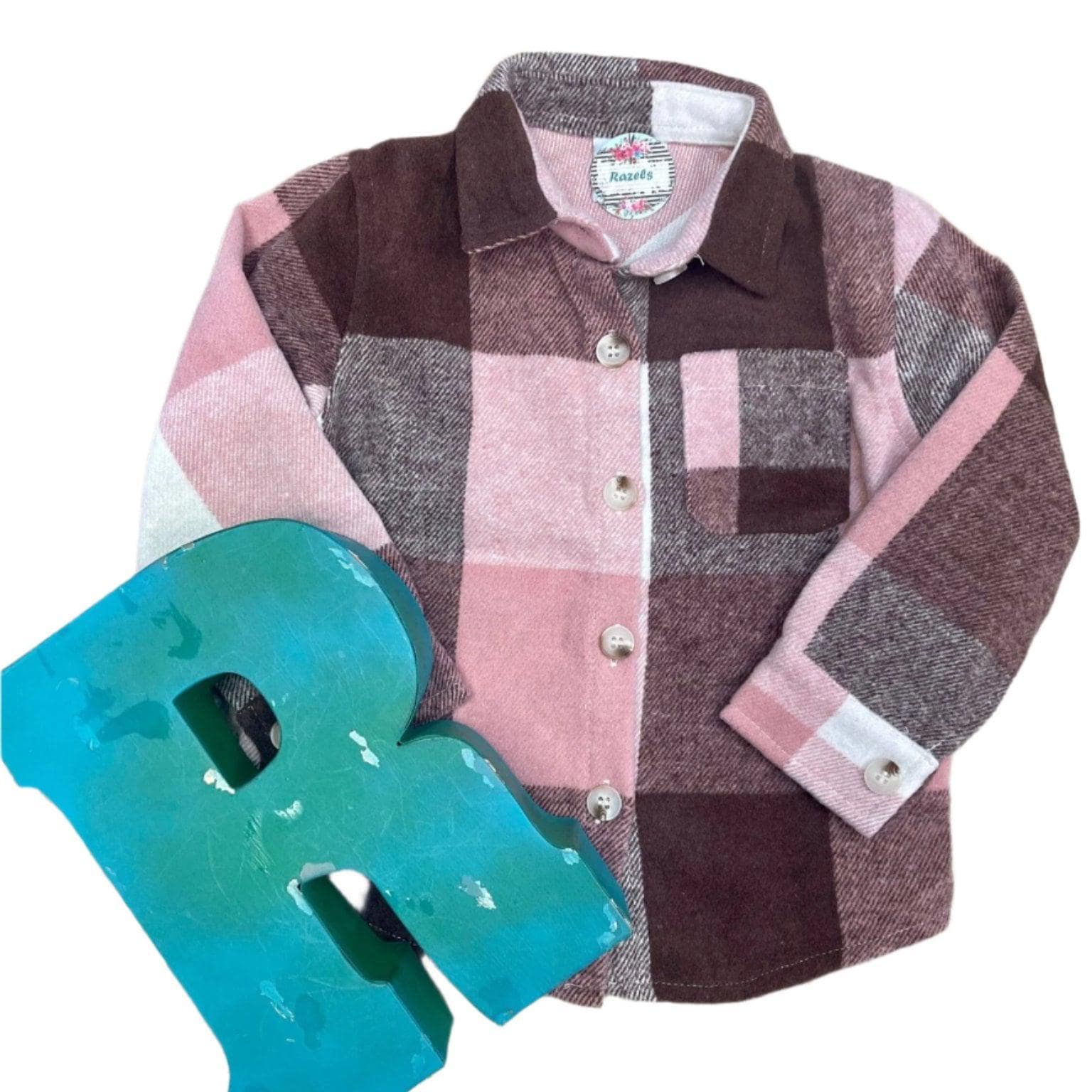 Kids Flannel Shirts, Plaid Button-Up Shirt, Plaid Shacket, Kids Long Sleeve Shirts
✔ Timeless Plaid Design – Featuring functional breast pockets and adjustable cuffs for a practical yet stylish look.
✔ Versatile for Every Occasion – Great for school, outdoor adventures, or casual everyday wear.
✔ Two Fun Colors – Choose from Orange Plaid or Pink Plaid… or grab both!
✔ Perfect Fit for All Ages – Available in sizes 3/6 months to 14/16.