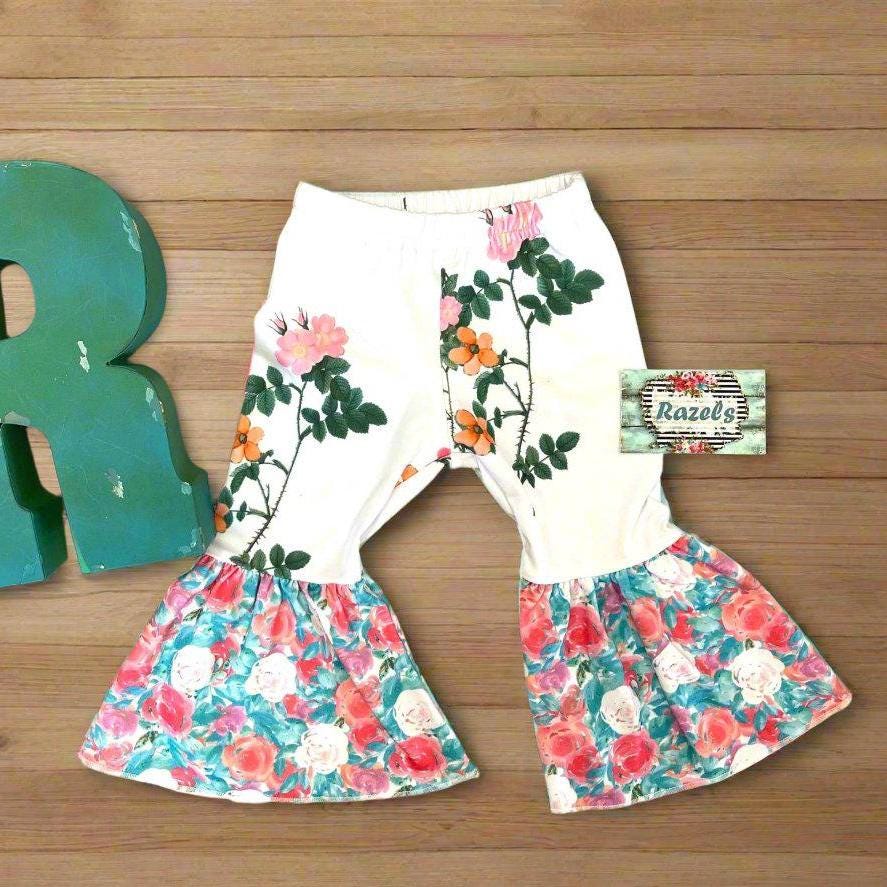 Floral Bell Bottoms designed with vibrant flower patterns and fun, playful colors are made with high-quality materials that promise comfort and durability, ensuring they’ll be a favorite all season long. These Wildflower pants will not disappoint!
