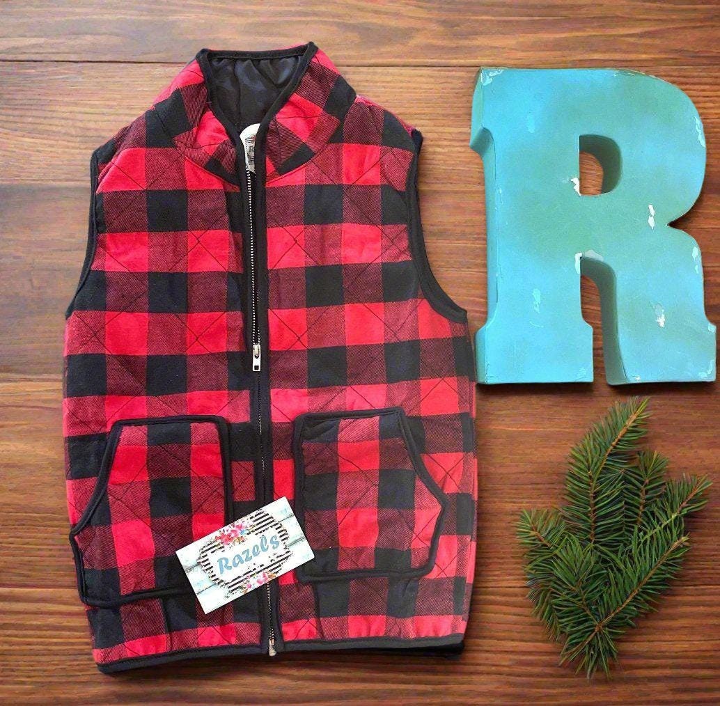 kids red and black buffalo check vest. Christmas Season Vest features a quilted design, zipper and two front pockets.