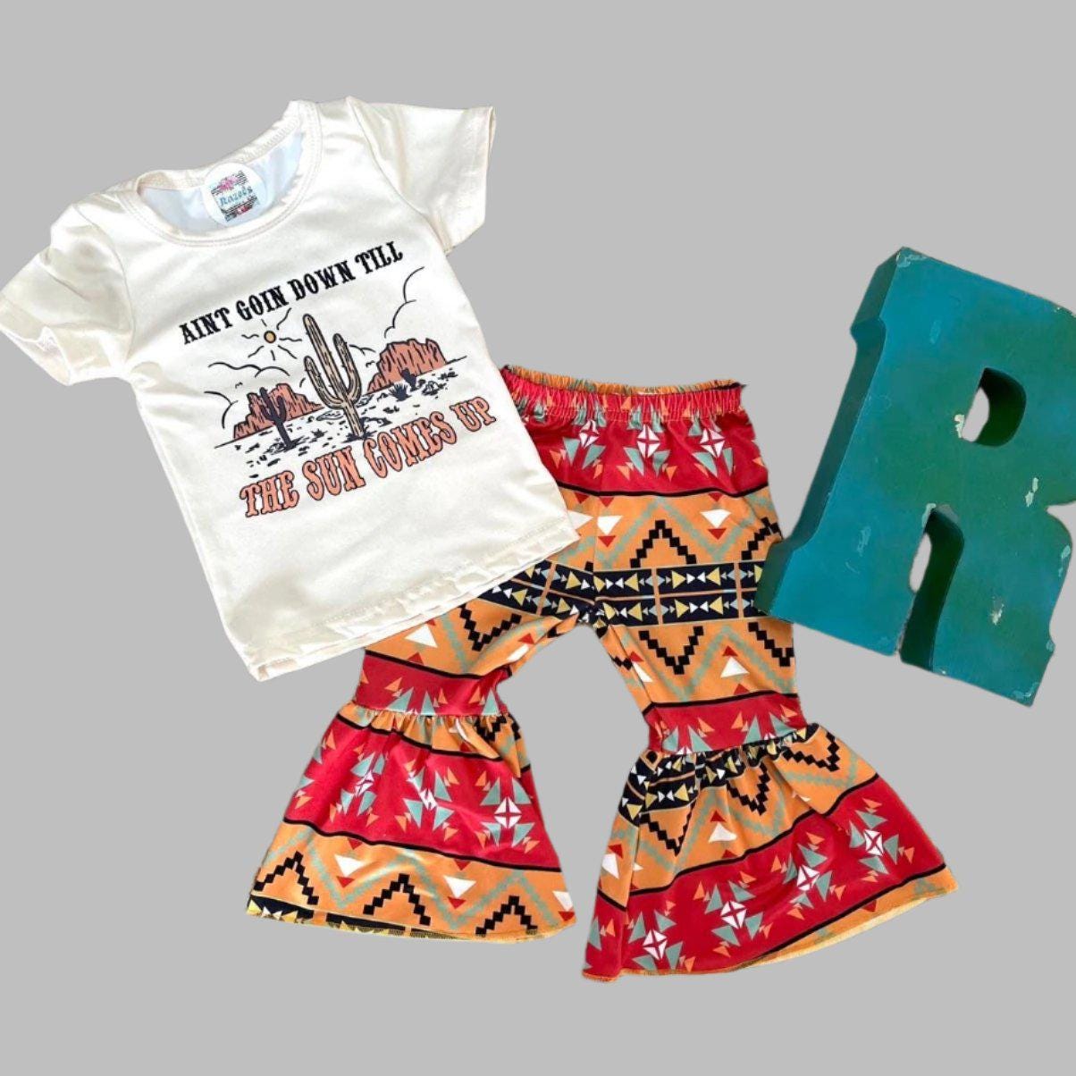 🌅 Ain’t Goin’ Down ’Til The Sun Comes Up – Bell Bottom Cowgirl Set (Girls 8/9 Only) | CLOSEOUT $10!
“Ain’t goin’ down ’til the sun comes up!”
And neither is she! 😂 Your little wild one is gonna shine in this rodeo-ready bell bottom outfit that’s full of spunk and Southwestern sass.
✨ Only size 8/9 left – and once it's gone, it's GONE! Final closeout price: just $10!