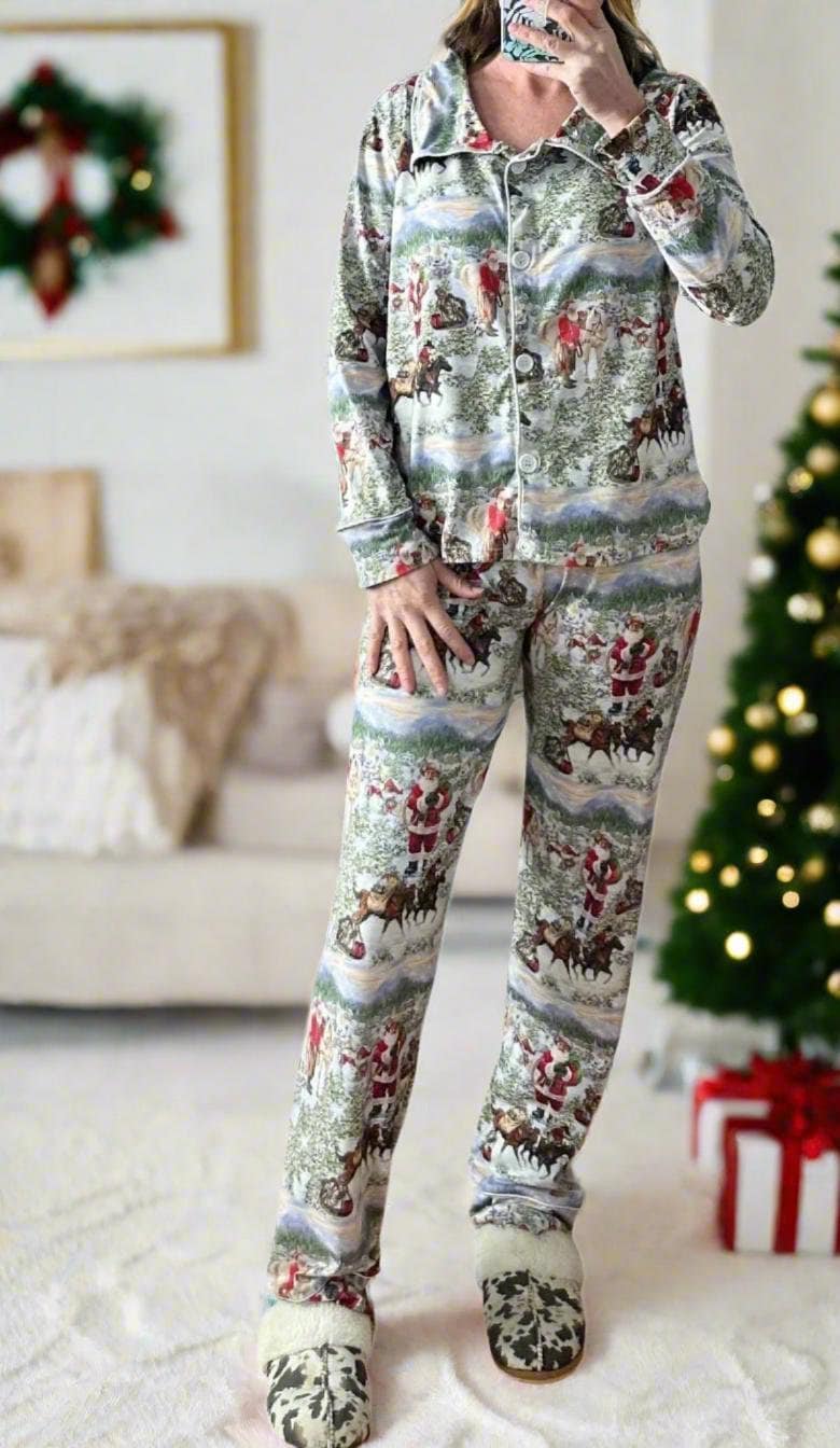 cowboy santa christmas pajamas featuring Cowboy Santa delivering packages on his best horse. A great family pajamas have a button down long sleeve top and pajama pant bottoms. Western Christmas pajamas for the whole family!