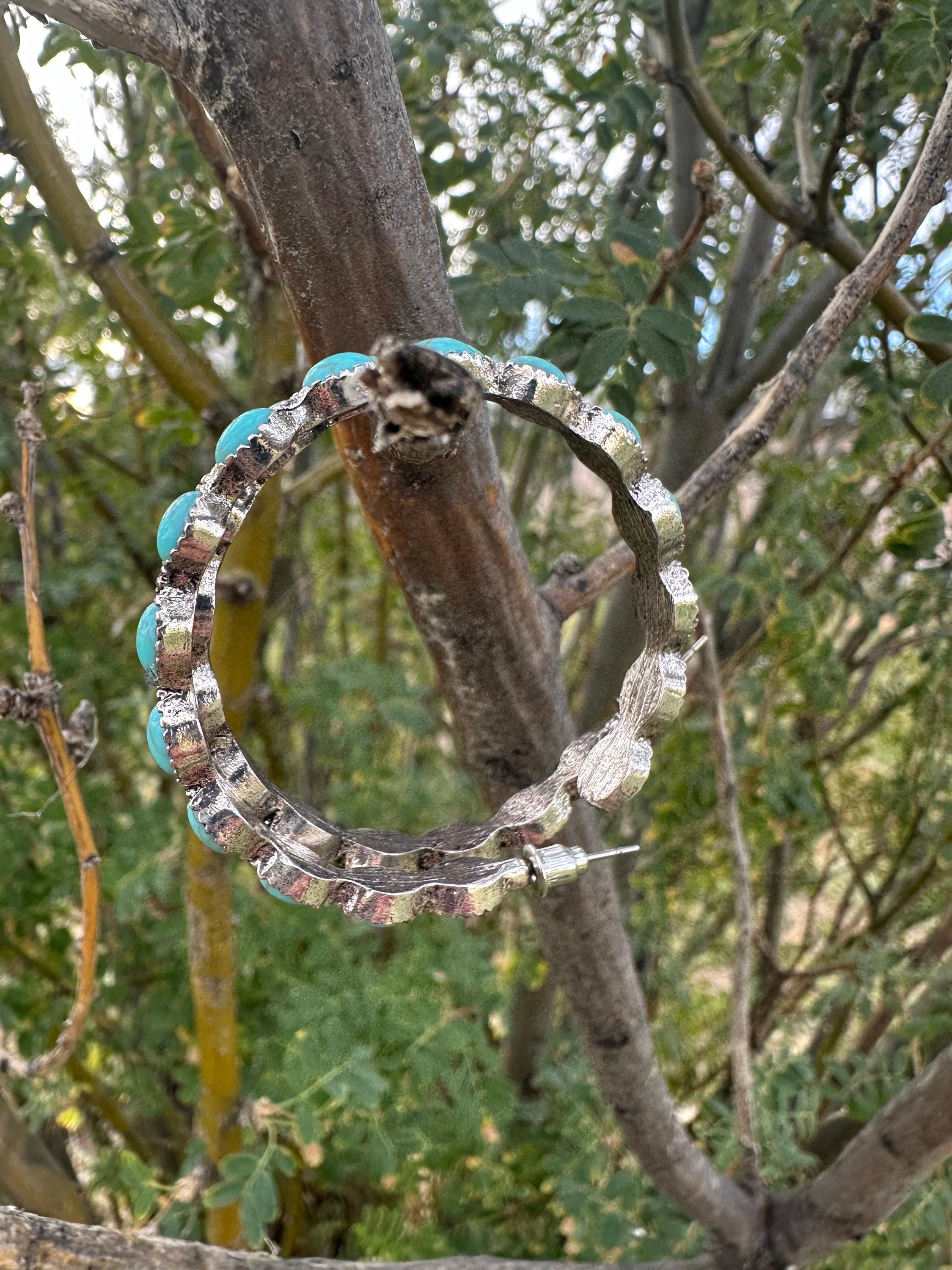 Western Turquoise Hoop Earrings ✨Western Earrings for Women
Featuring a bold C-shape design, a burnished silver finish, and vibrant gemstone inlay, they blend rustic elegance with boho-chic vibes. Large hoop earrings 1.8" diameter. Ship FREE w/ $35+