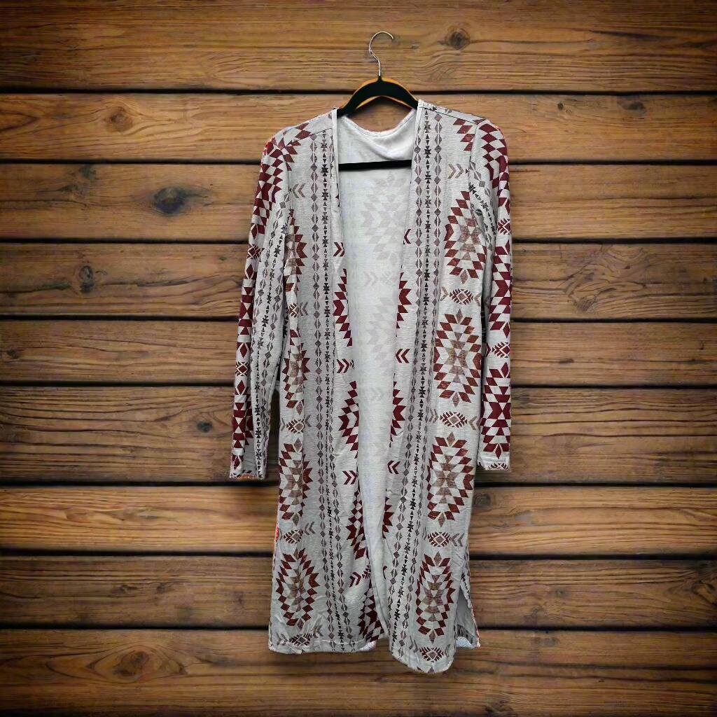 Western Aztec Print Cardigan – Cozy Fall Layering Piece
features an Aztec print throughout, and an open front design. This Western Cardigan offers versatile styling options, making it the perfect layering piece for any outfit.