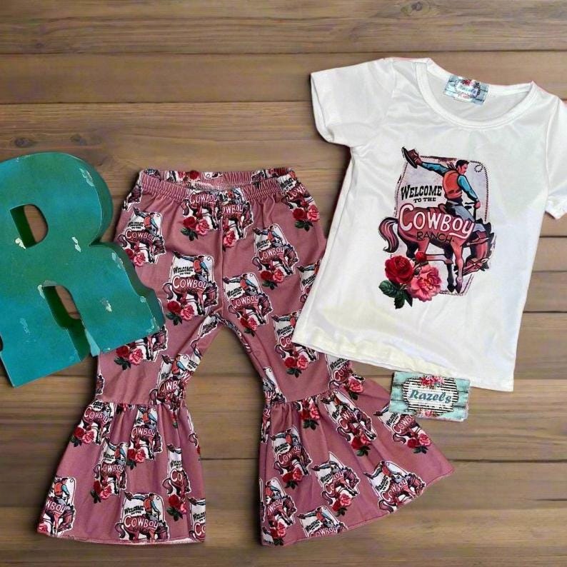 Get ready to welcome the Cowboy Ranch in style with these adorable Matching Sister Outfits! 🤠 Featuring a Cowgirl Bell Bottom Outfit and a coordinating one-piece, this set is perfect for siblings who want to share the Western love. Ships FREE $35+