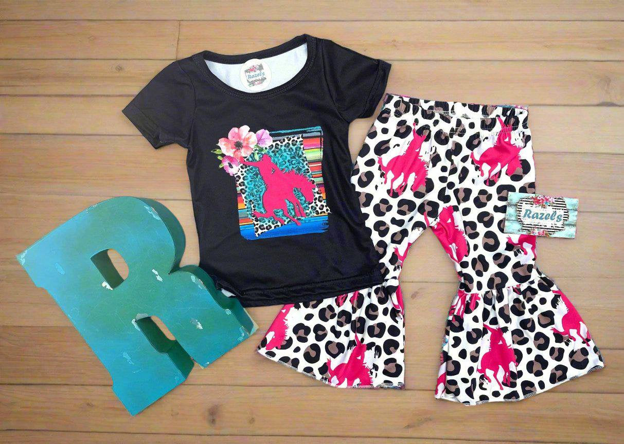 Cowgirl Bell Bottom Outfit featuring Pink Bronc Rider silhouettes and bold animal print! Perfect for rodeo fans and little ones who love a touch of Western flair, this Girls Bell Bottom Set is both stylish and fun. Ships FREE with $35+ order