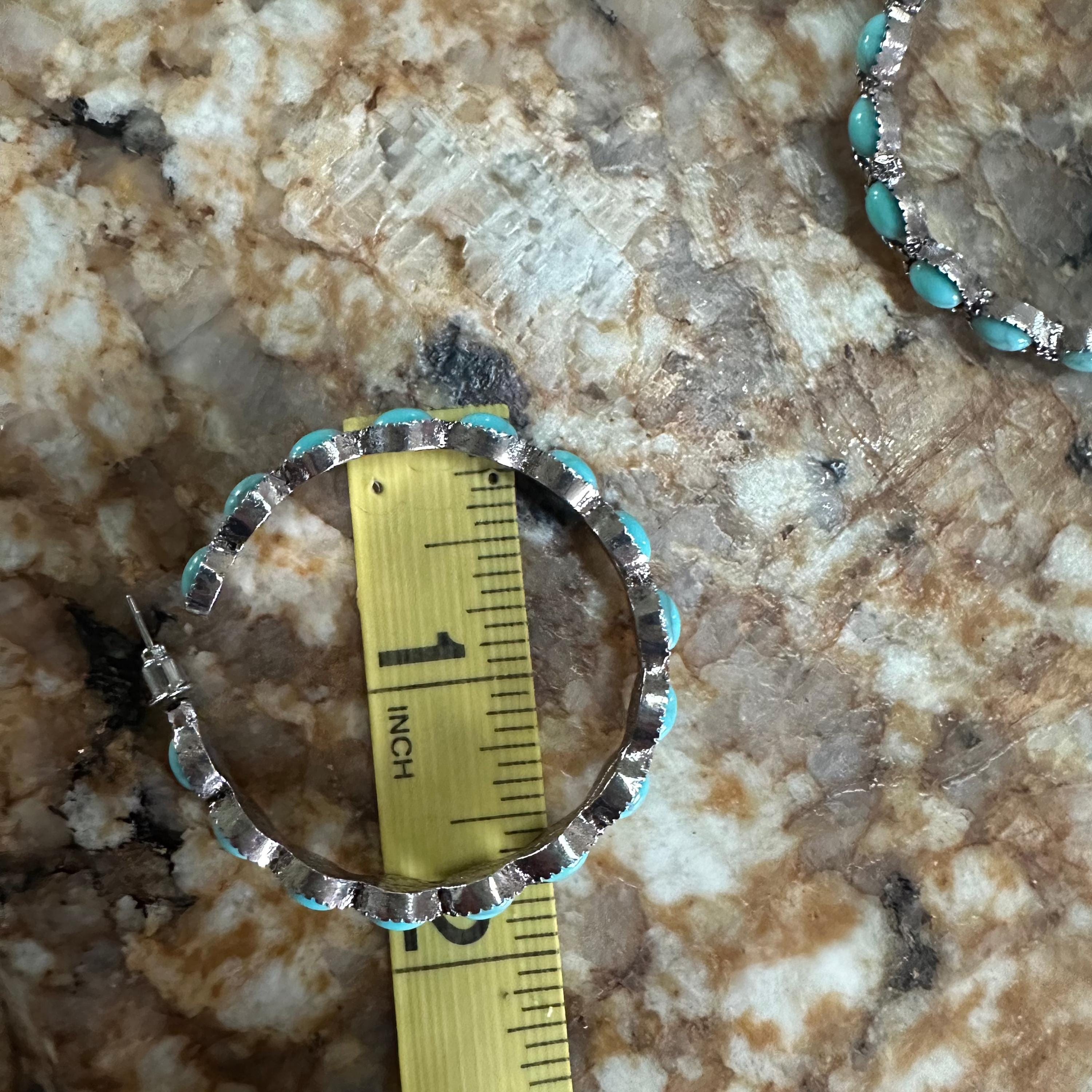 Western Turquoise Hoop Earrings ✨Western Earrings for Women
Featuring a bold C-shape design, a burnished silver finish, and vibrant gemstone inlay, they blend rustic elegance with boho-chic vibes. Large hoop earrings 1.8" diameter. Ship FREE w/ $35+