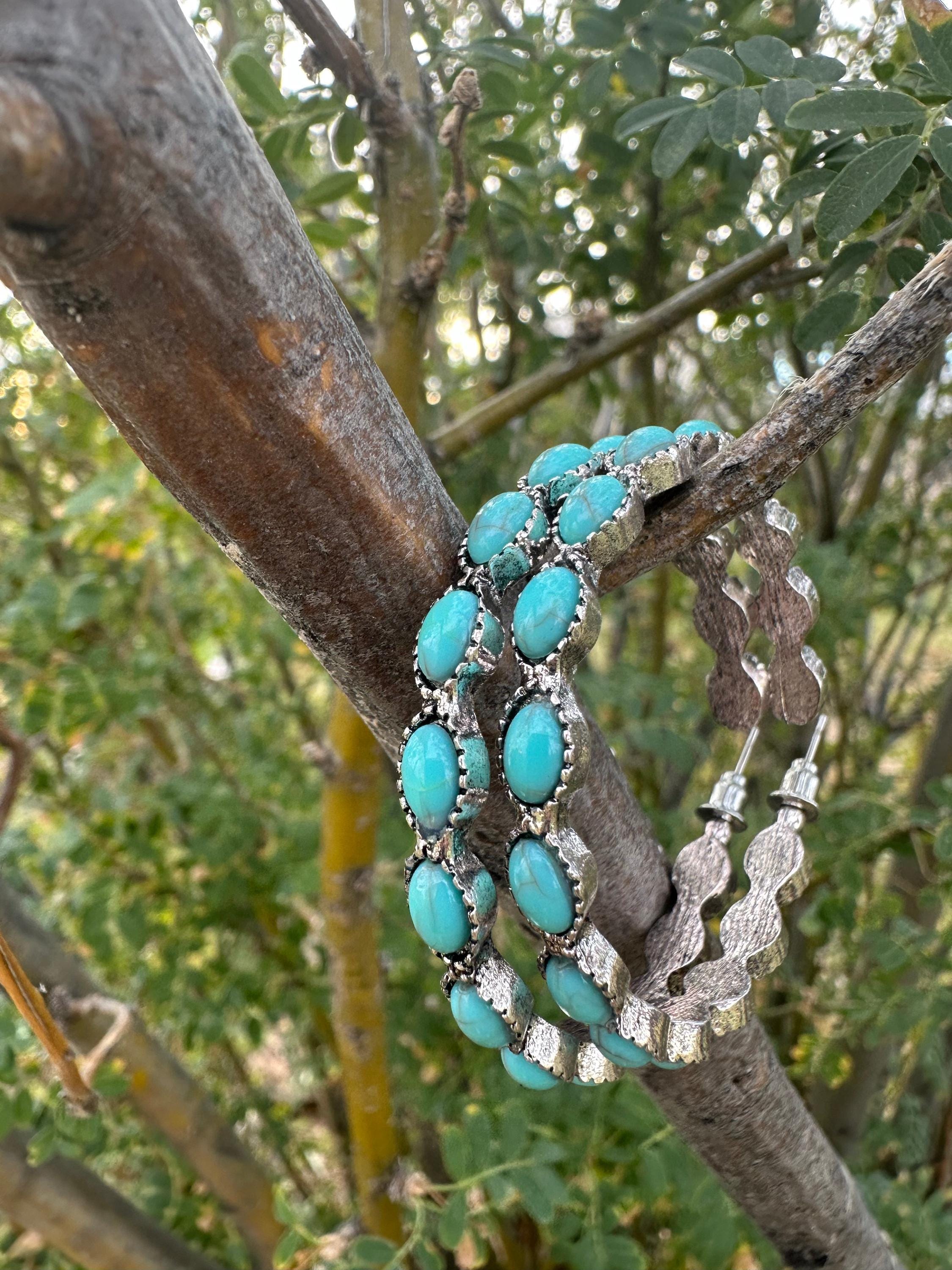 Western Turquoise Hoop Earrings ✨Western Earrings for Women
Featuring a bold C-shape design, a burnished silver finish, and vibrant gemstone inlay, they blend rustic elegance with boho-chic vibes. Large hoop earrings 1.8" diameter. Ship FREE w/ $35+