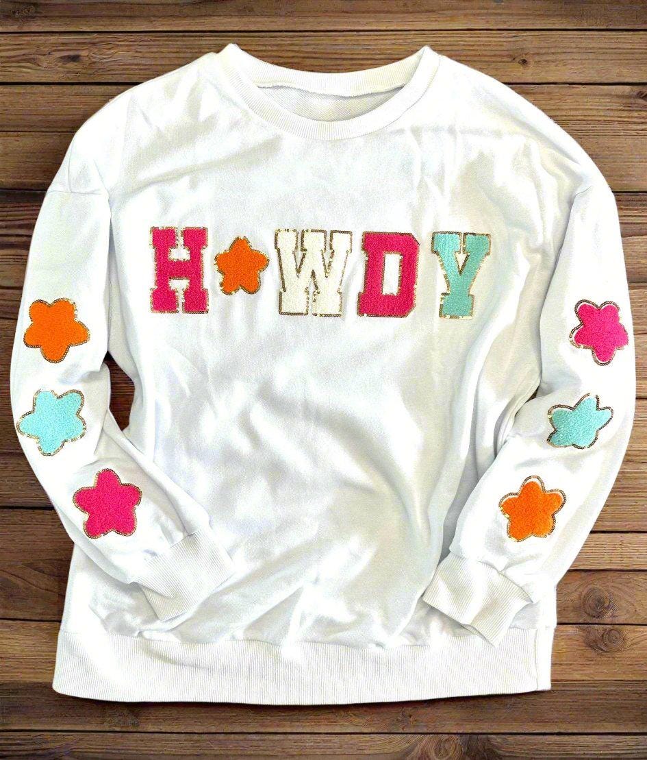 Howdy Sweatshirt – Glitter Patch Cowgirl Sweatshirt for Western Vibes! Add some sparkle to your casual wardrobe with our Howdy Sweatshirt. This women’s Western sweatshirt features a dazzling glitter patch “Howdy” design with matching stars!