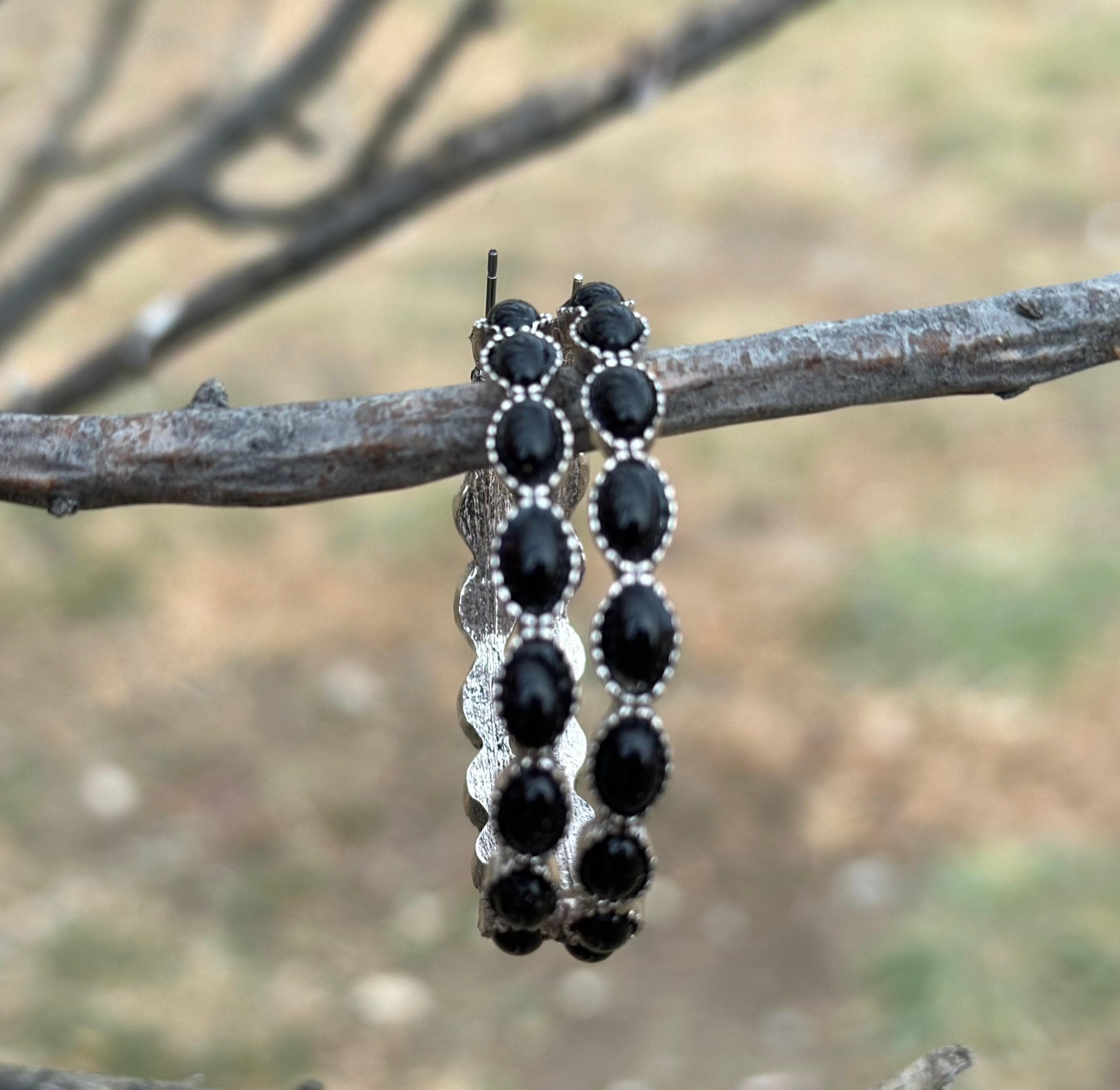 Black Hoop Earrings 🖤 feature a stylish C-shape design, crafted from premium metals with a burnished silver finish. Large hoops are 1.8 inches round and are also available in turquoise, red, and pink! Earrings ship FREE with $35+ purchase