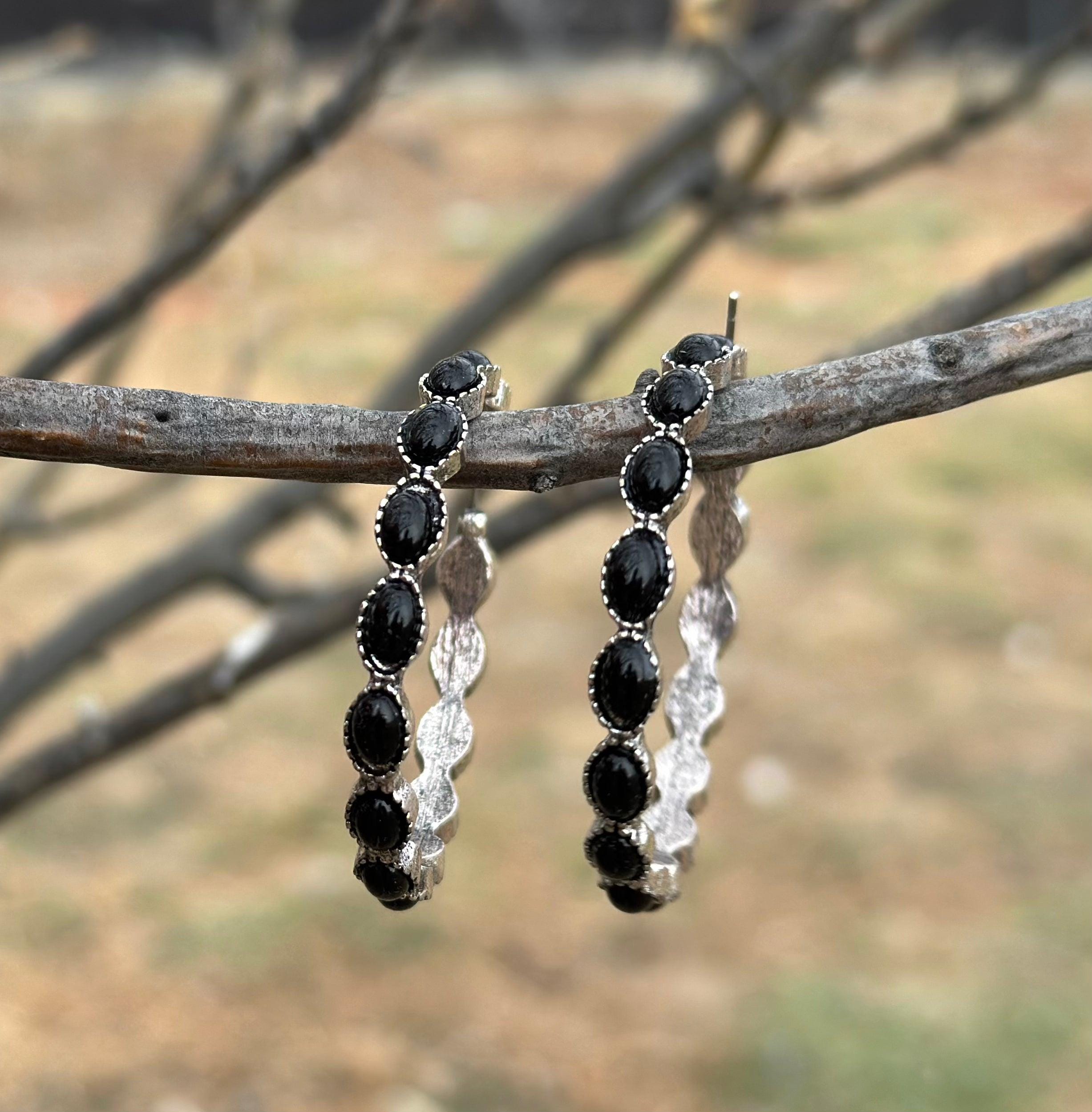 Black Hoop Earrings 🖤 feature a stylish C-shape design, crafted from premium metals with a burnished silver finish. Large hoops are 1.8 inches round and are also available in turquoise, red, and pink! Earrings ship FREE with $35+ purchase