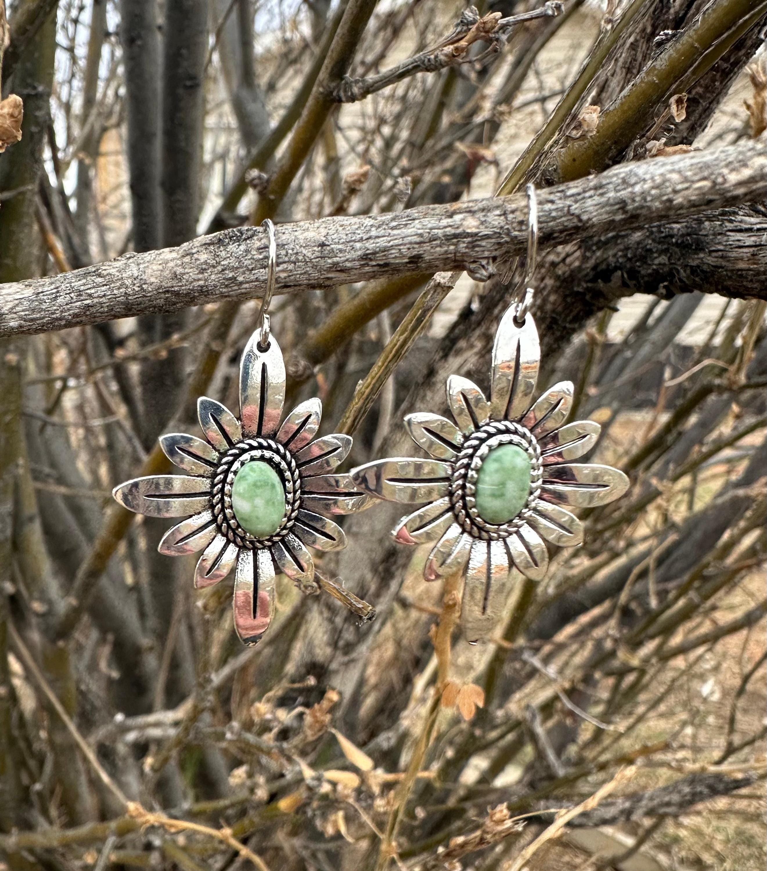 Light Green Earrings | WESTERN FLOWER Earrings | Western Dangle Earrings | Stamped Silver Earring | Cowgirl Earrings Featuring a delicate stamped silver floral design with a light green center stone. Ships FREE with $35+ purchase. Great Western Gift!