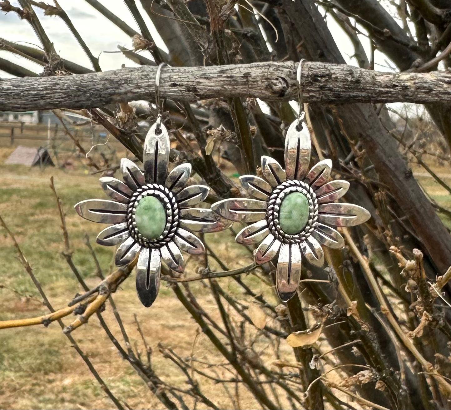 Light Green Earrings | WESTERN FLOWER Earrings | Western Dangle Earrings | Stamped Silver Earring | Cowgirl Earrings Featuring a delicate stamped silver floral design with a light green center stone. Ships FREE with $35+ purchase. Great Western Gift!