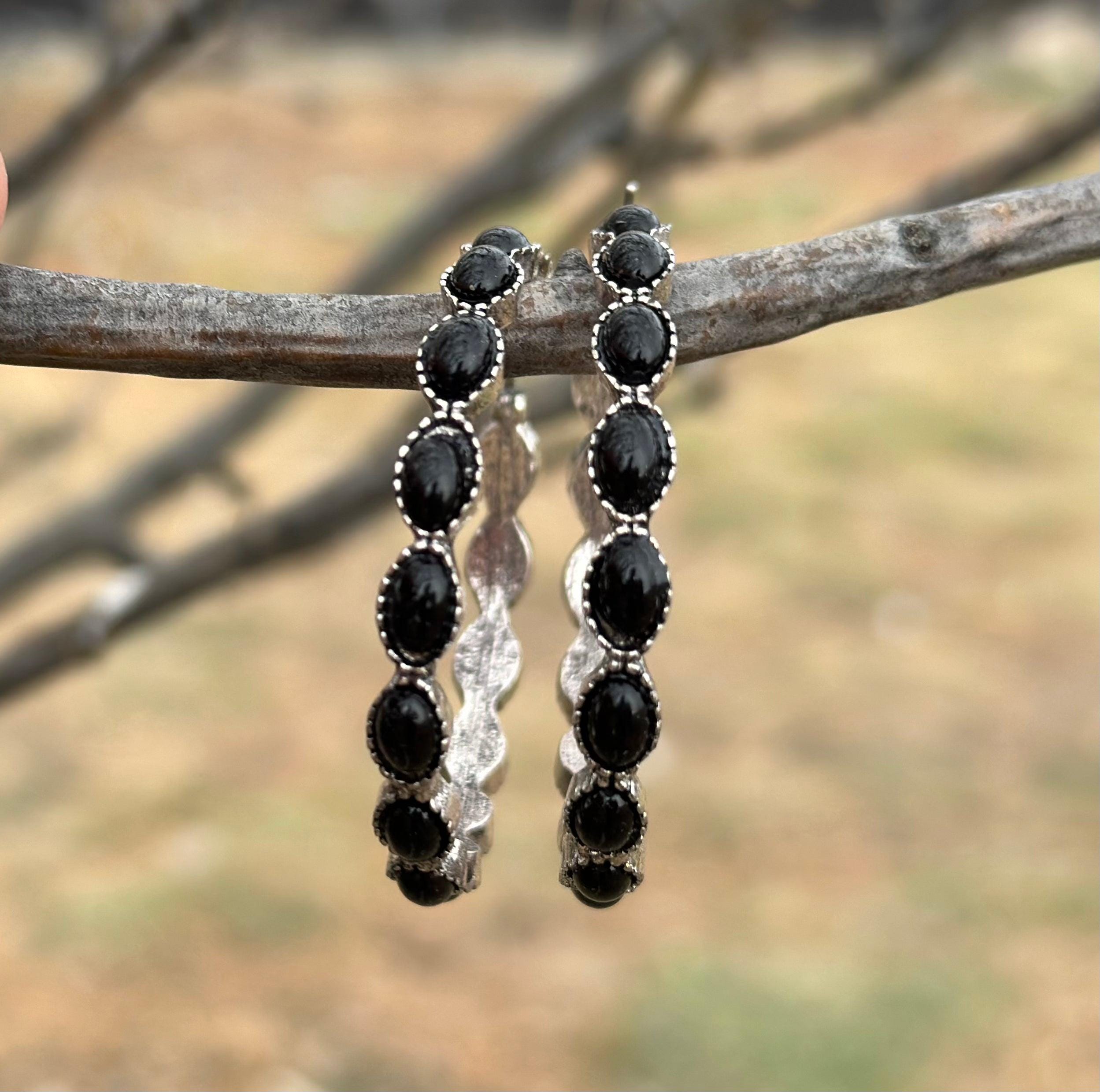 Black Hoop Earrings 🖤 feature a stylish C-shape design, crafted from premium metals with a burnished silver finish. Large hoops are 1.8 inches round and are also available in turquoise, red, and pink! Earrings ship FREE with $35+ purchase